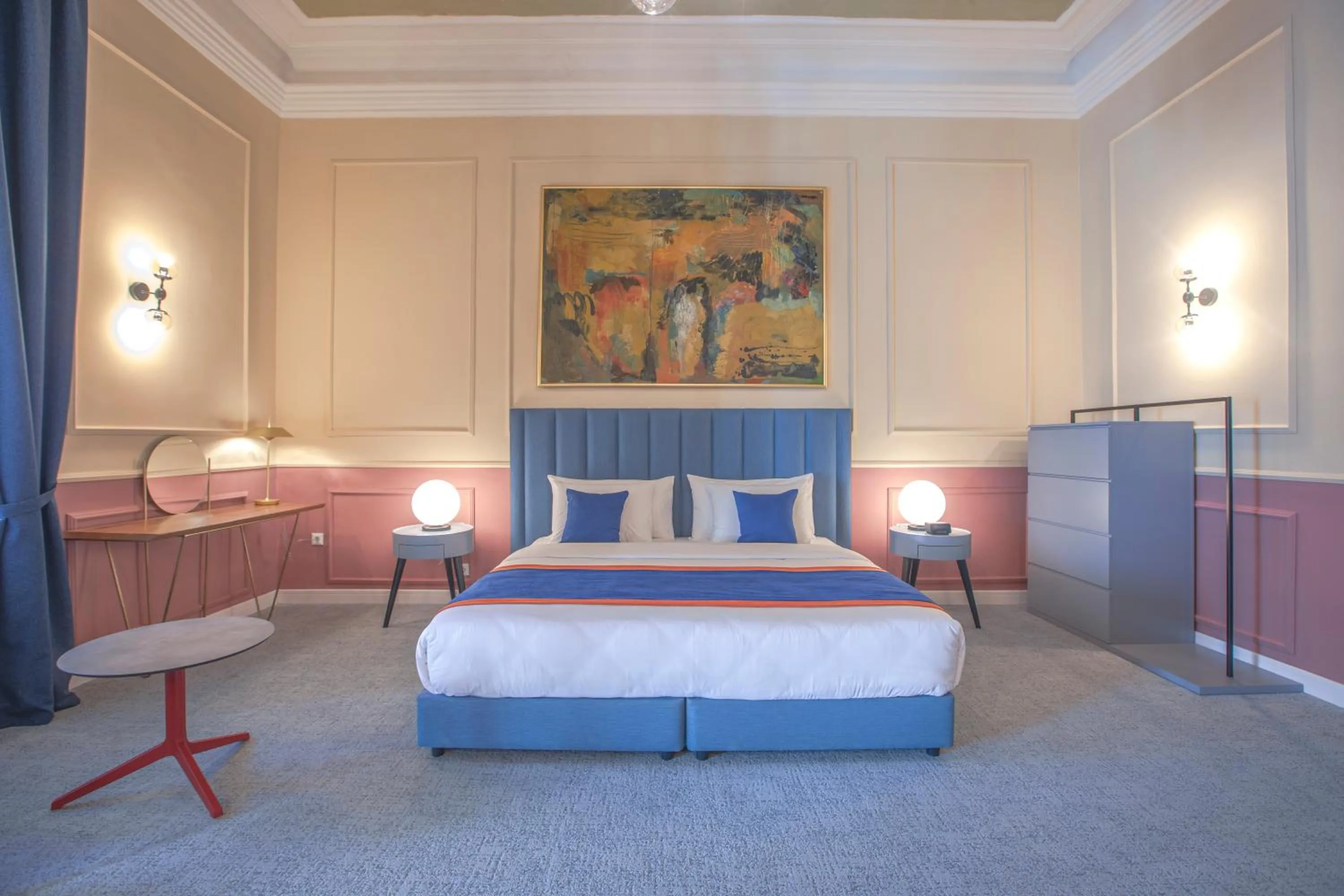 Bed in Heritage Hotel and Suites