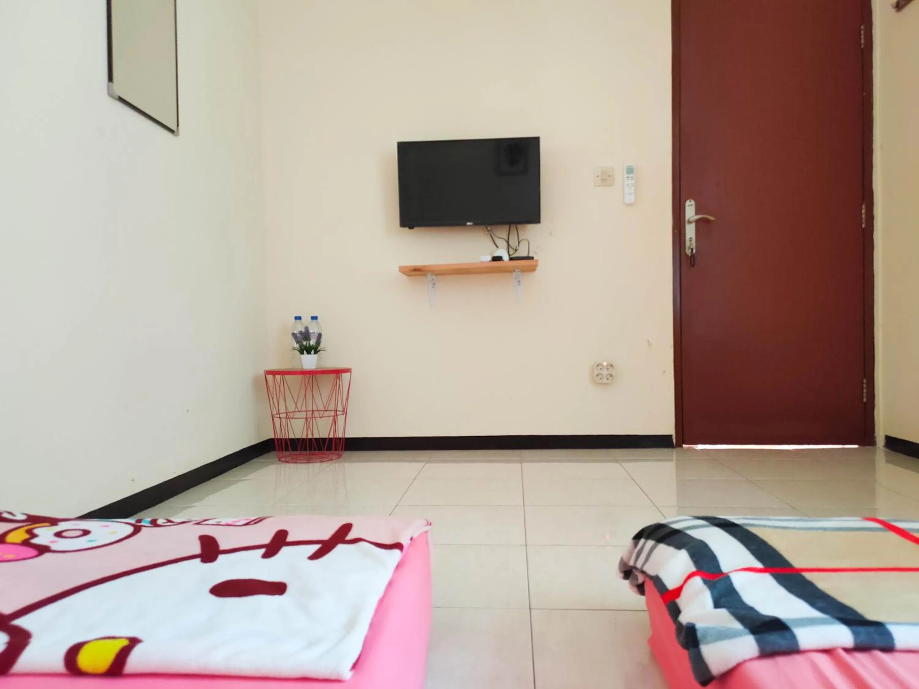 Communal lounge/ TV room in Green Surabaya Homey Syariah