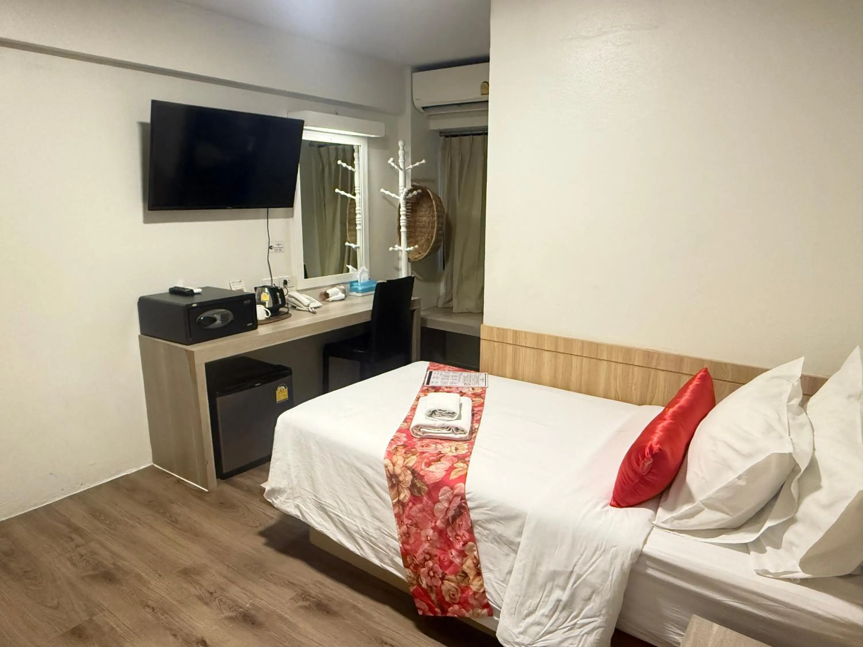 Bed in Wild Orchid Villa Bangkok