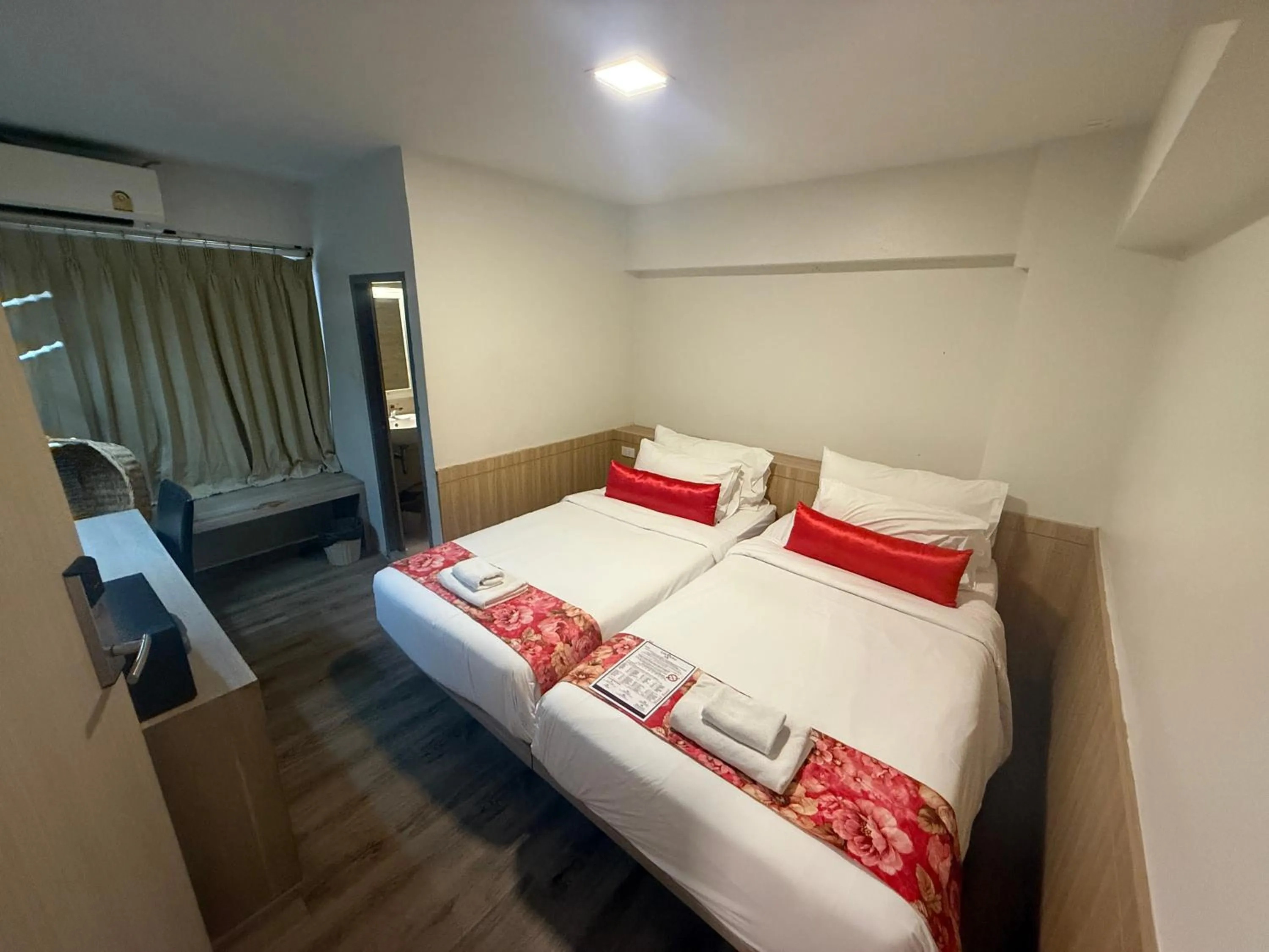 Bed in Wild Orchid Villa Bangkok