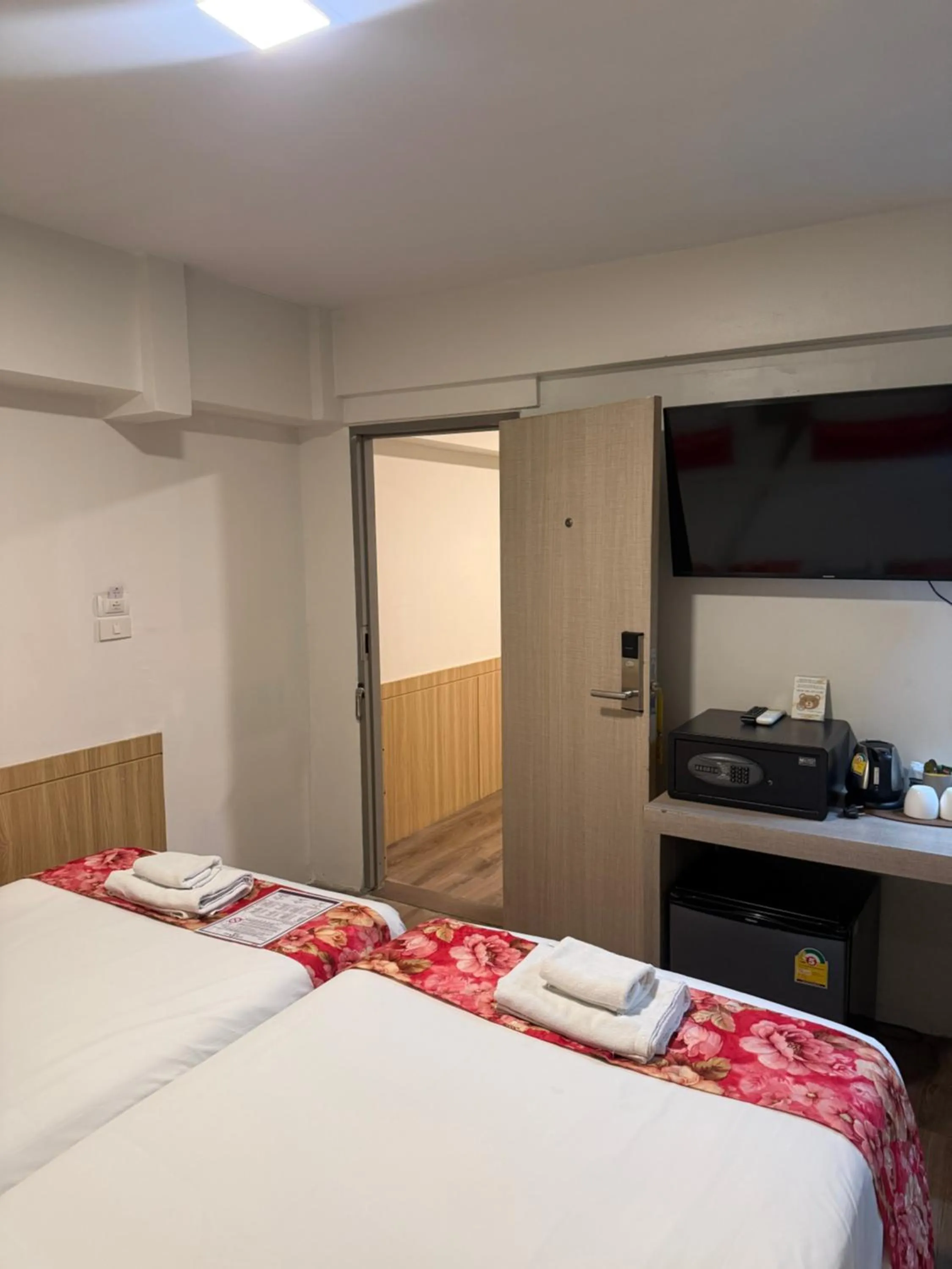 Bed in Wild Orchid Villa Bangkok