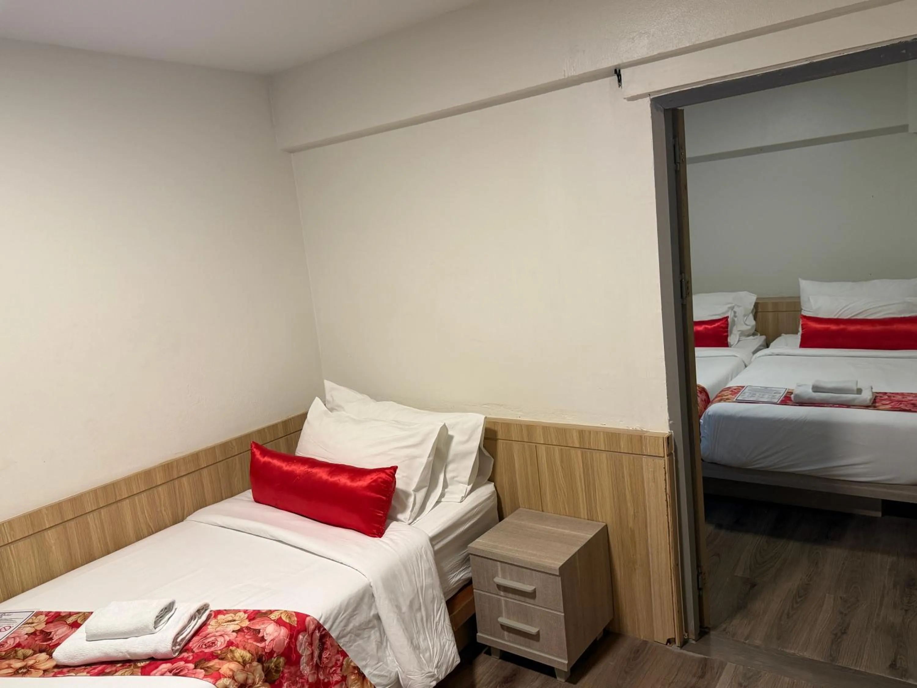 Bed in Wild Orchid Villa Bangkok