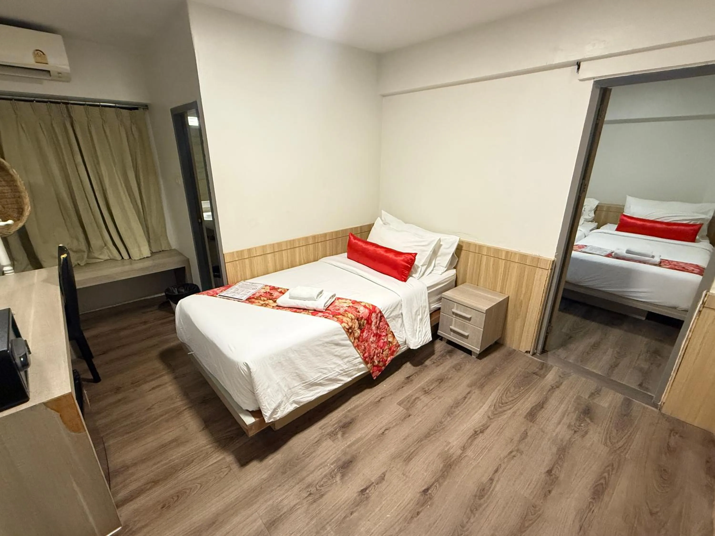 Bed in Wild Orchid Villa Bangkok