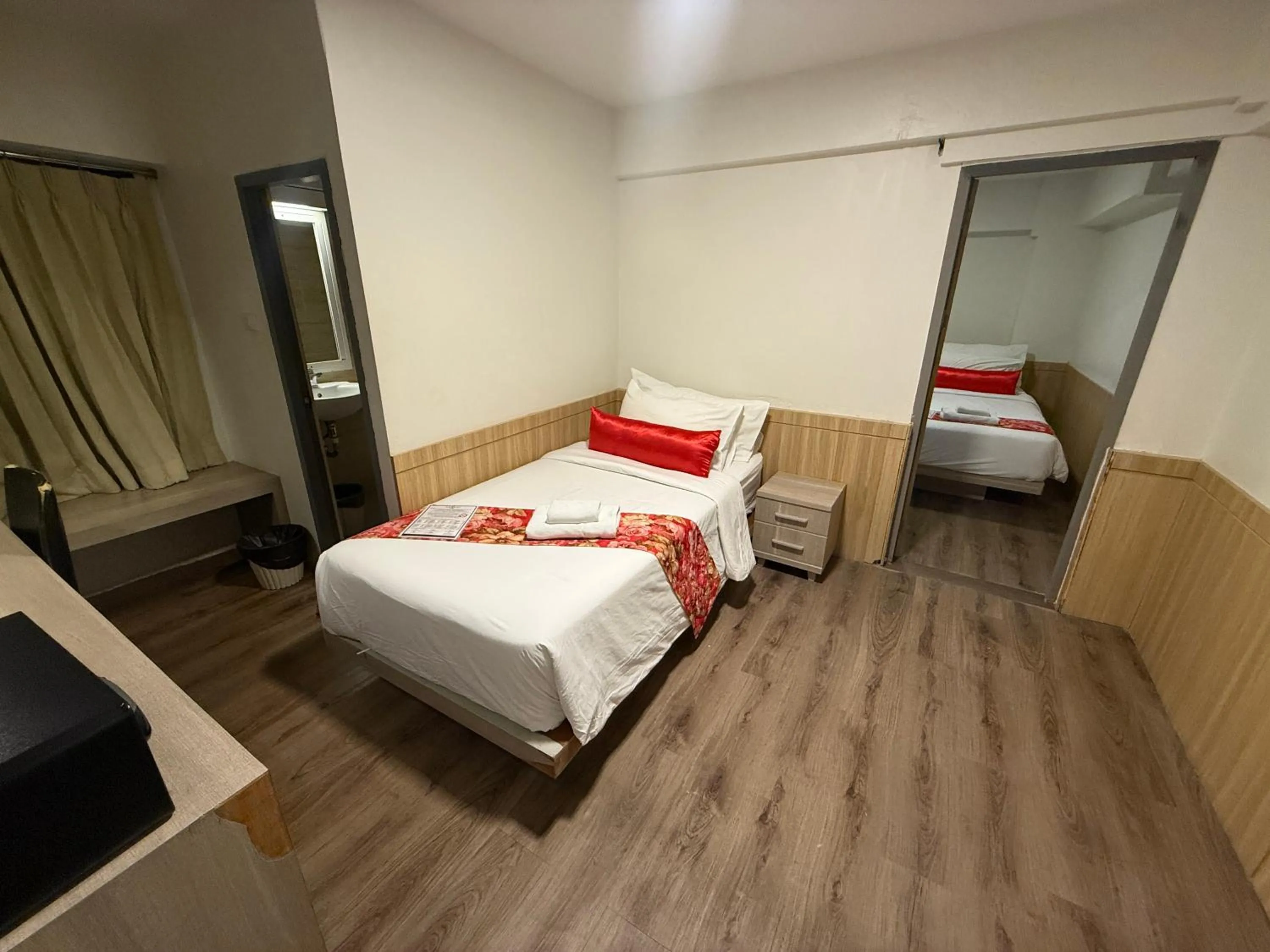 Bed in Wild Orchid Villa Bangkok