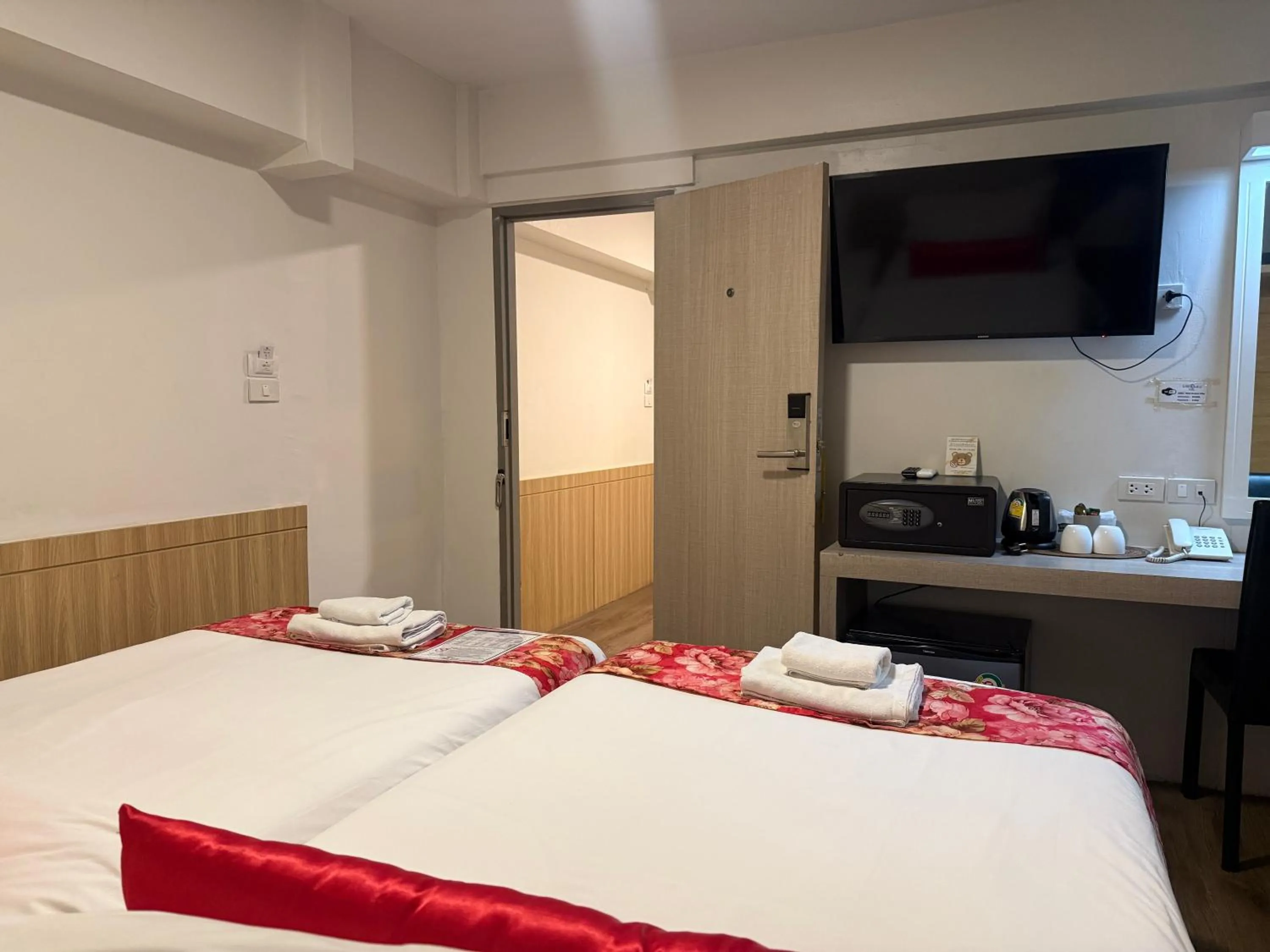 Bed in Wild Orchid Villa Bangkok