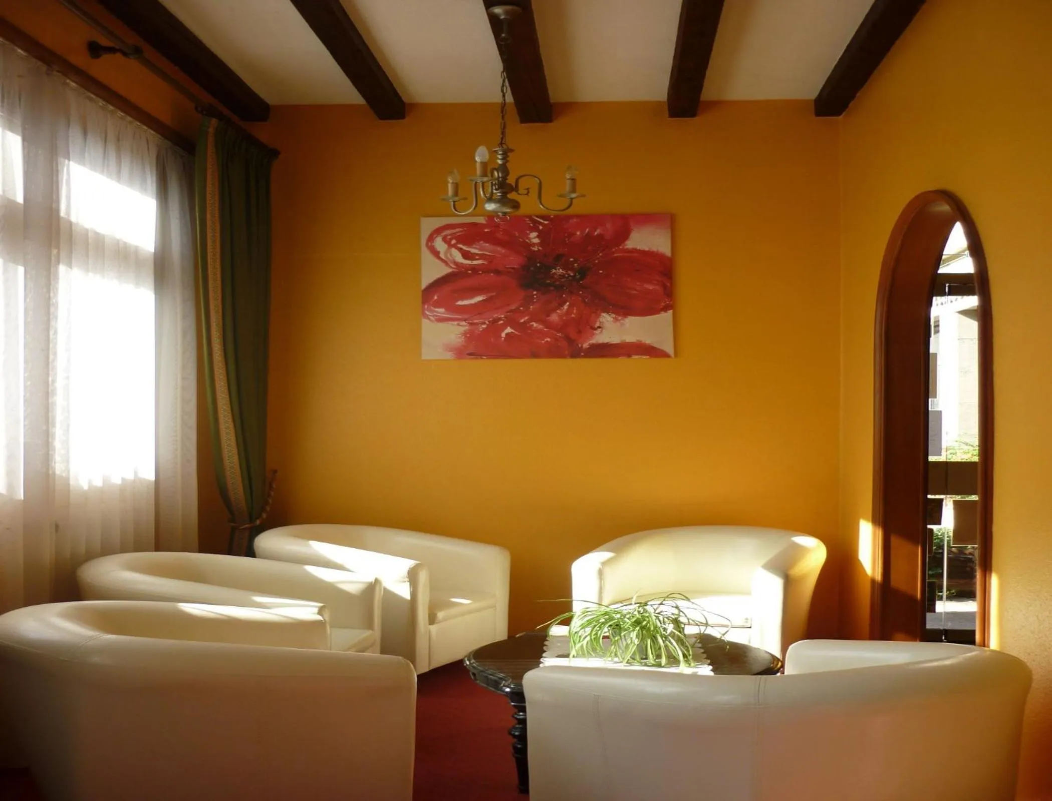 Communal lounge/ TV room in Logis-Cit'Hôtel des Vosges 5 rue de la gare