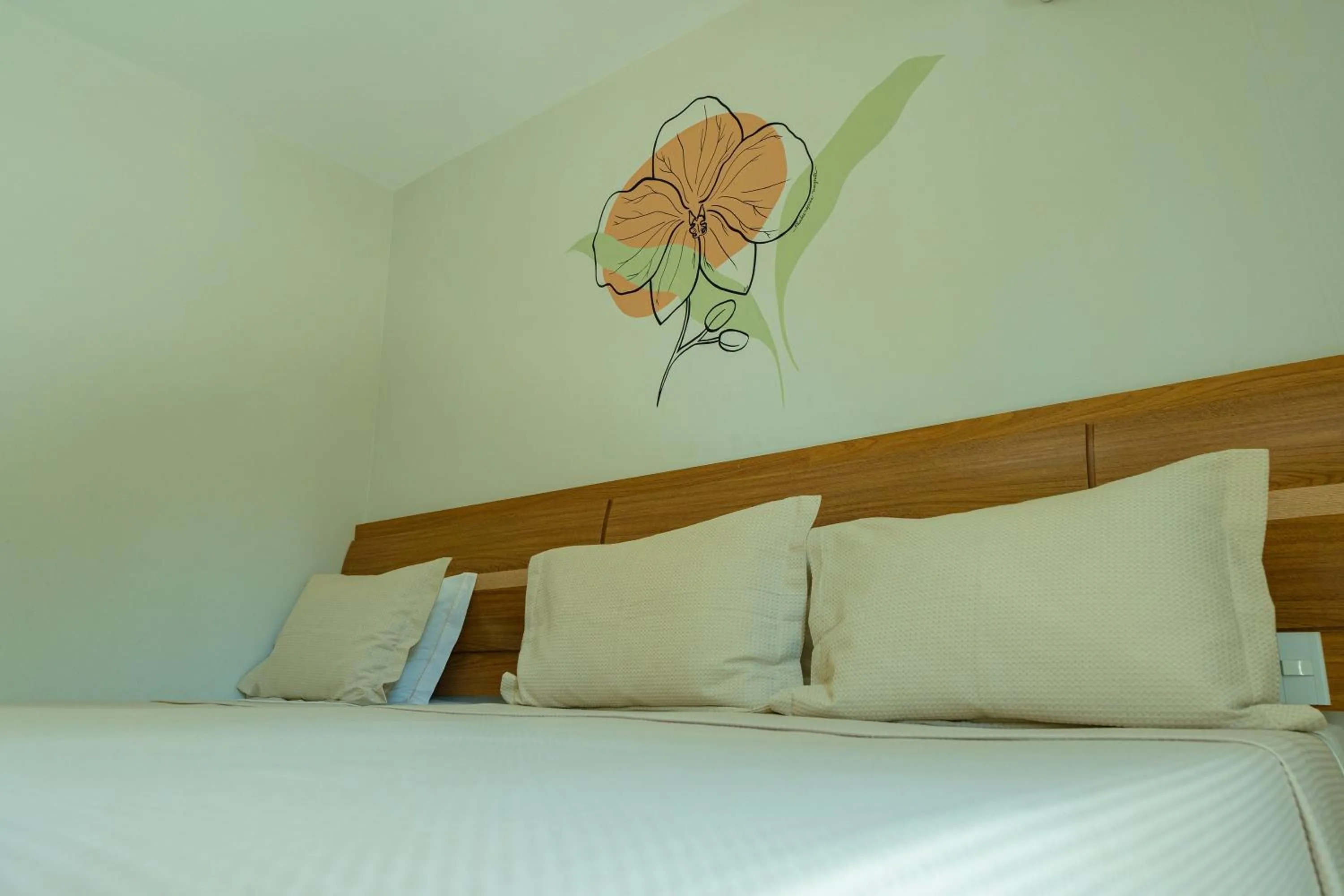 Bed in Orquídeas Praia Hotel