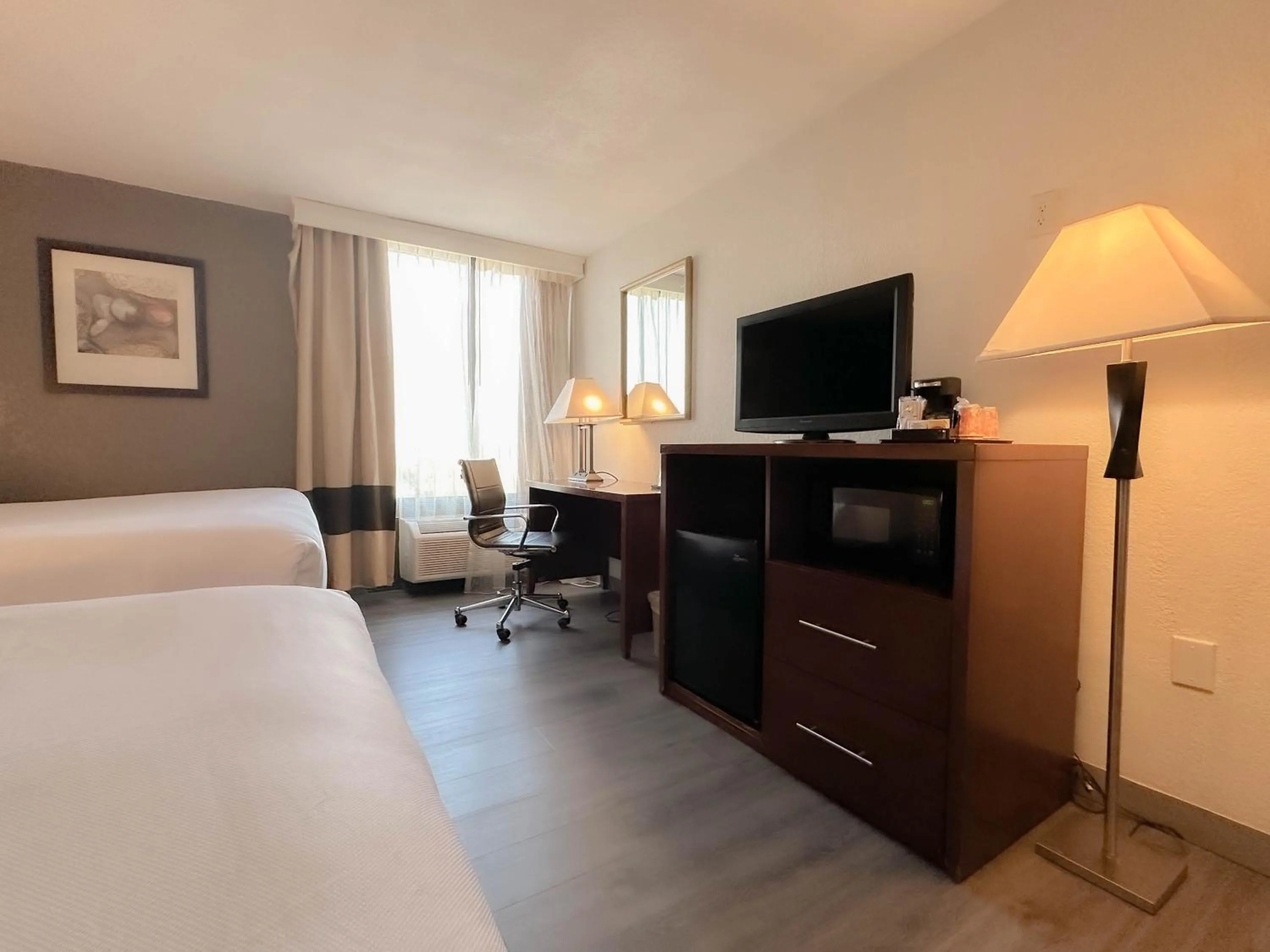 Bed in Comfort Inn & Suites Kissimmee by the Parks