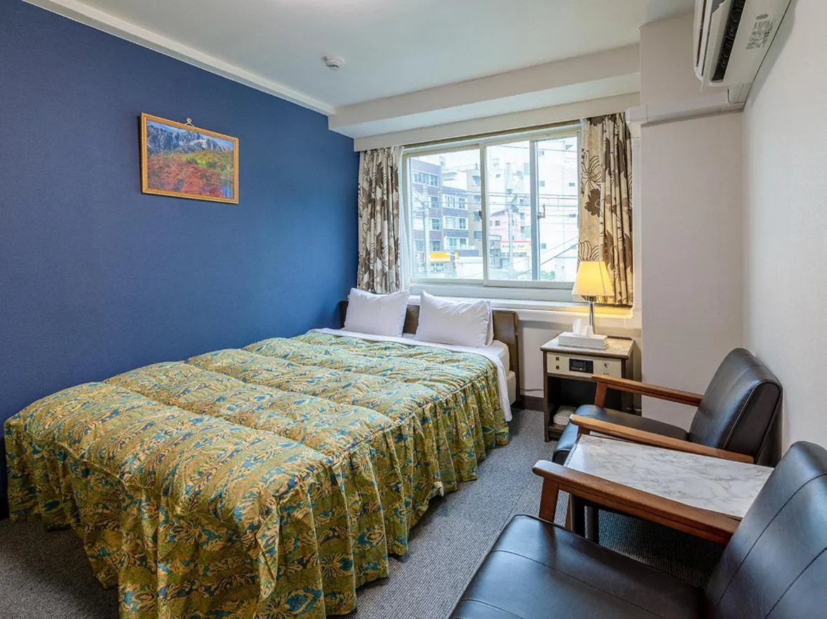 Photo of the whole room, Bed in Hotel Koryukaku