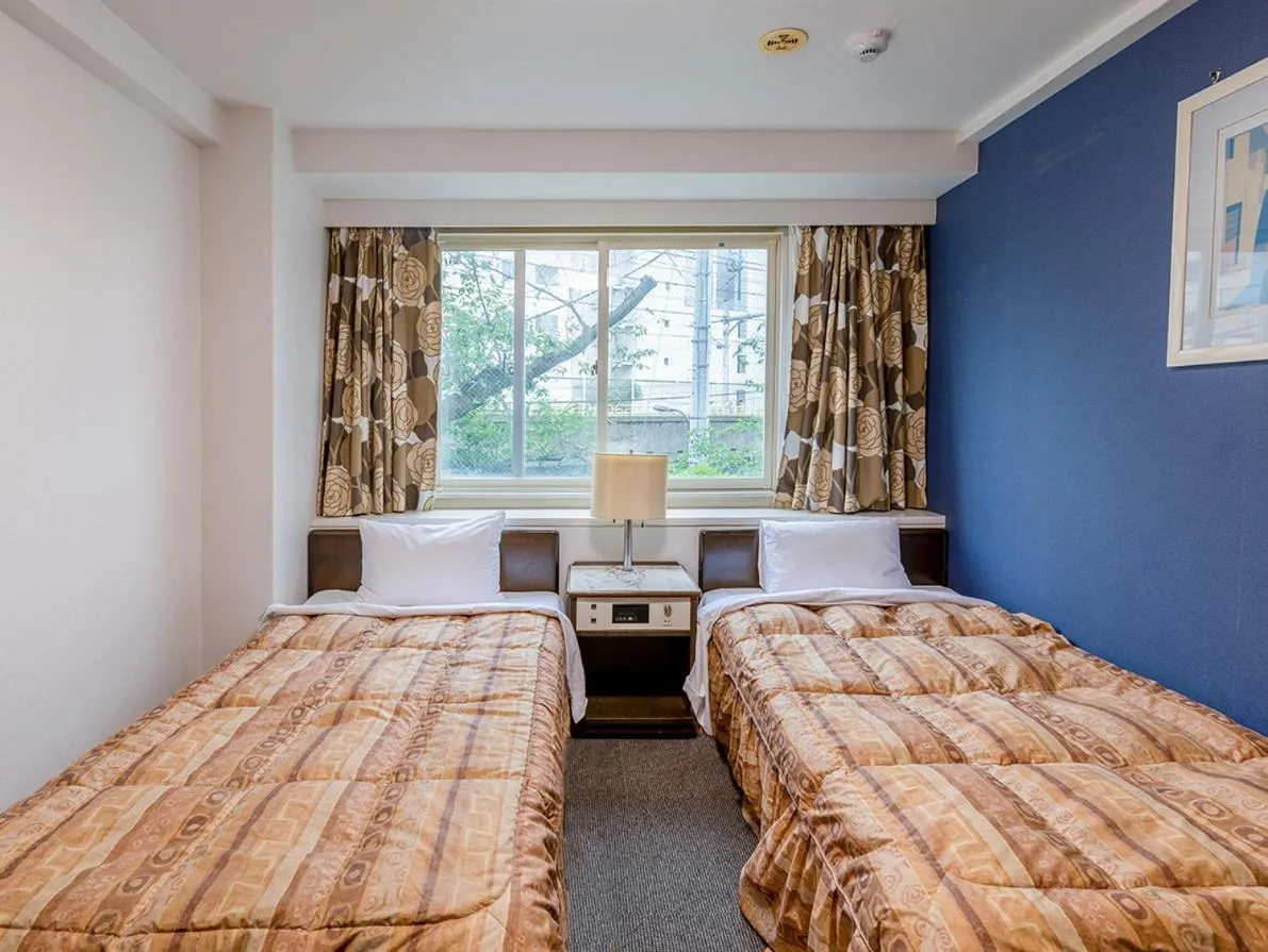 Bed in Hotel Koryukaku