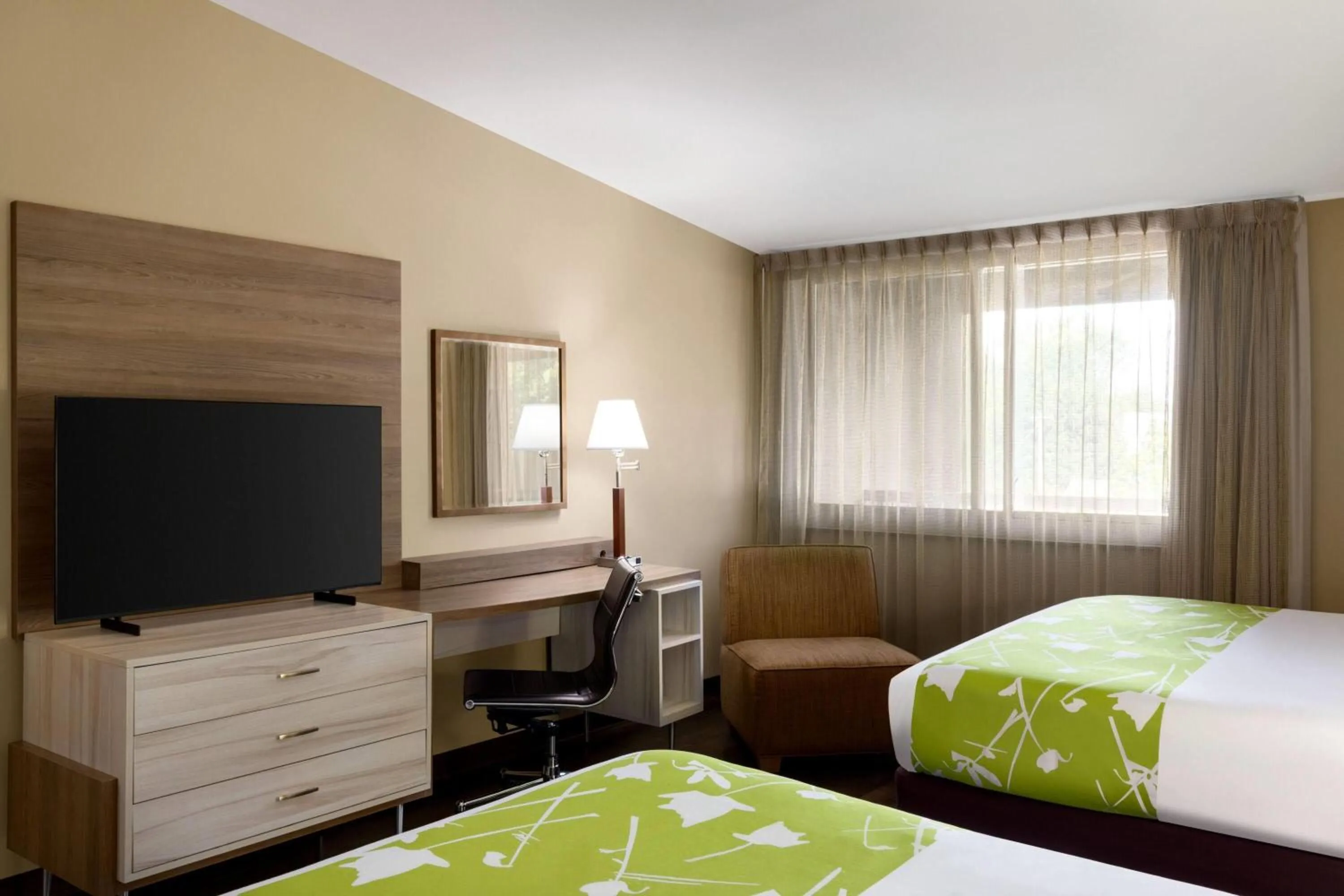 Photo of the whole room, Bed in Wyndham Garden Washington DC North