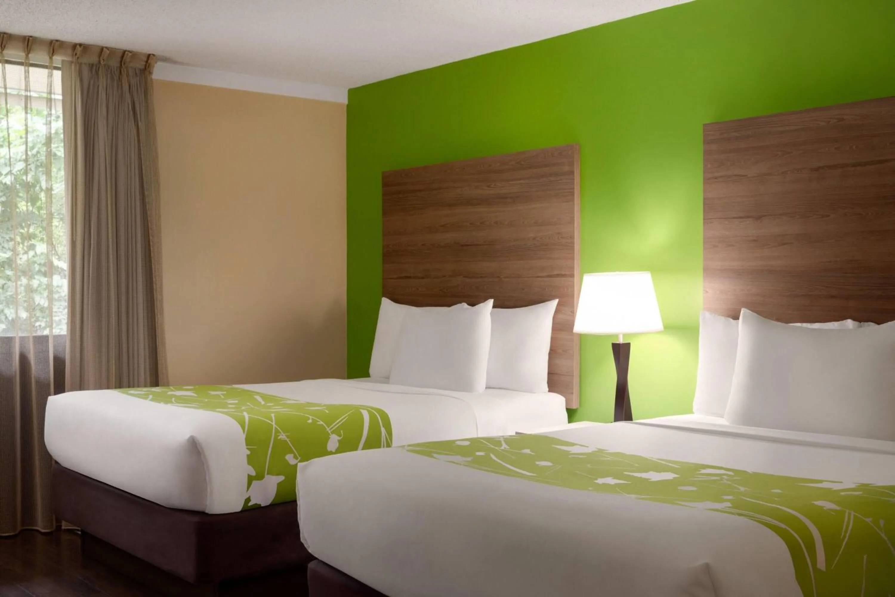 Photo of the whole room, Bed in Wyndham Garden Washington DC North