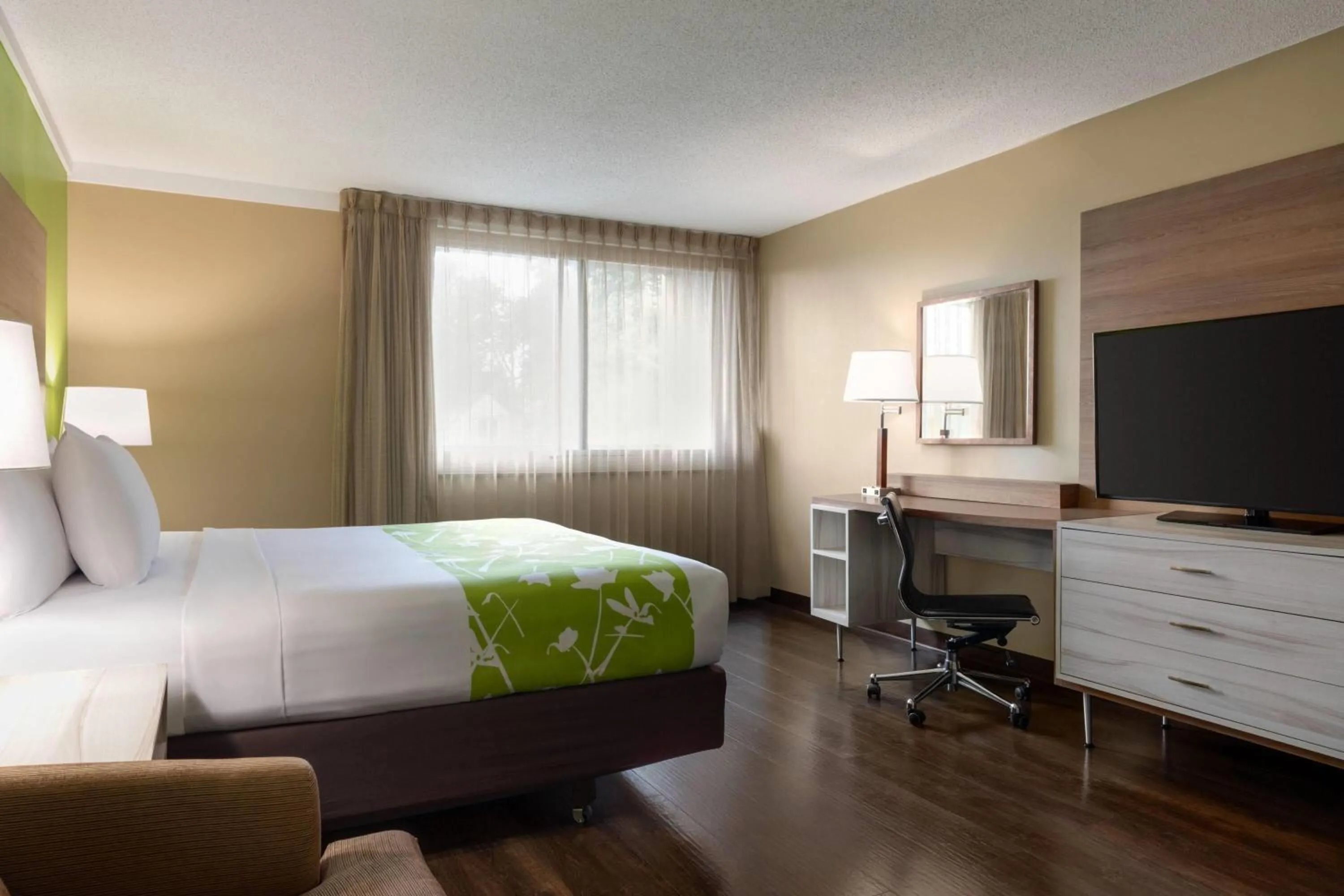 Photo of the whole room, Bed in Wyndham Garden Washington DC North