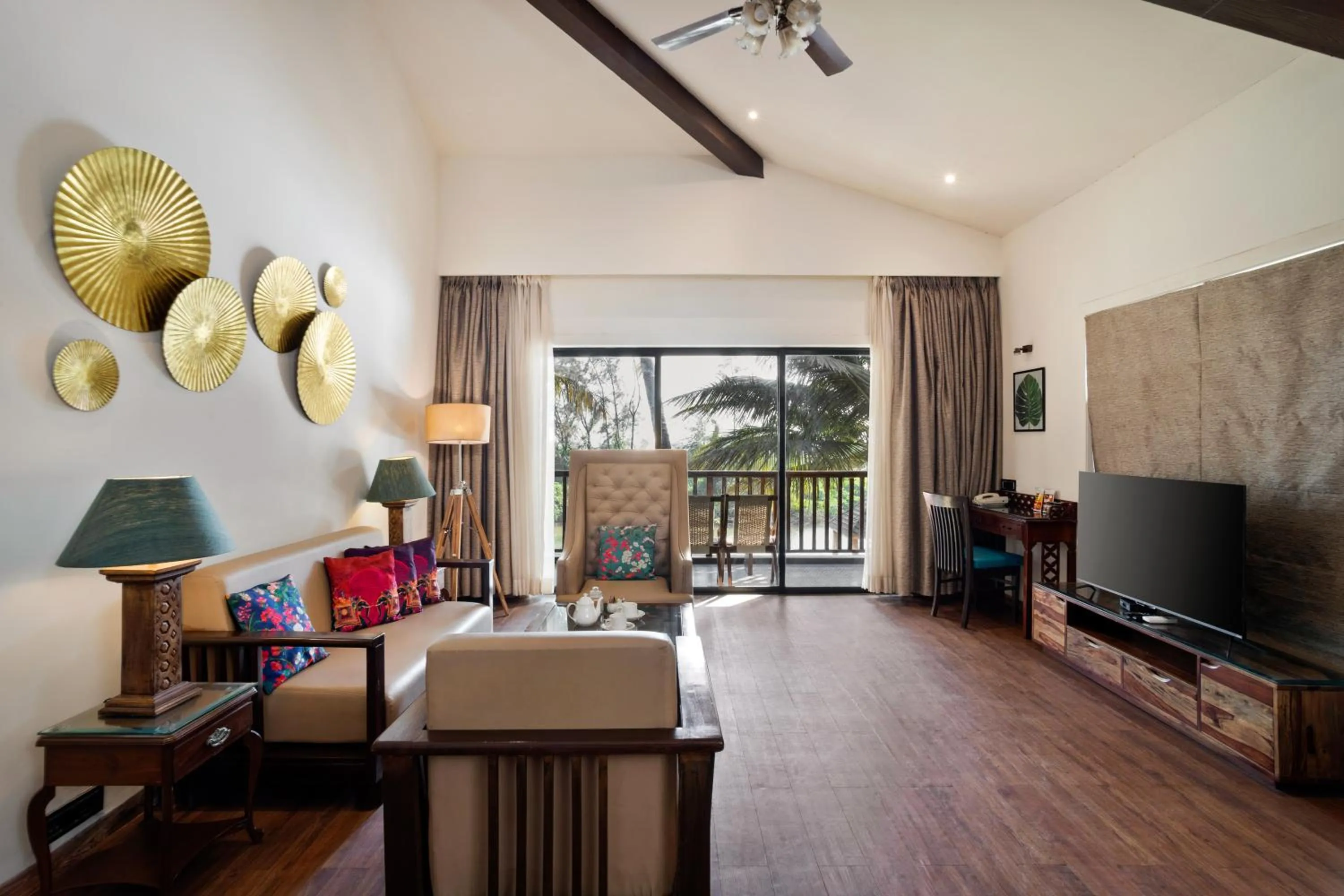 Seating area, Bed in Riva Beach Resort