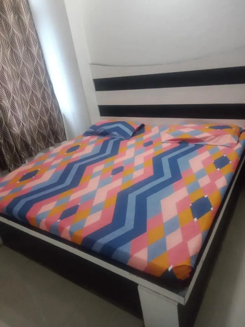 Bed in Sai Guest House