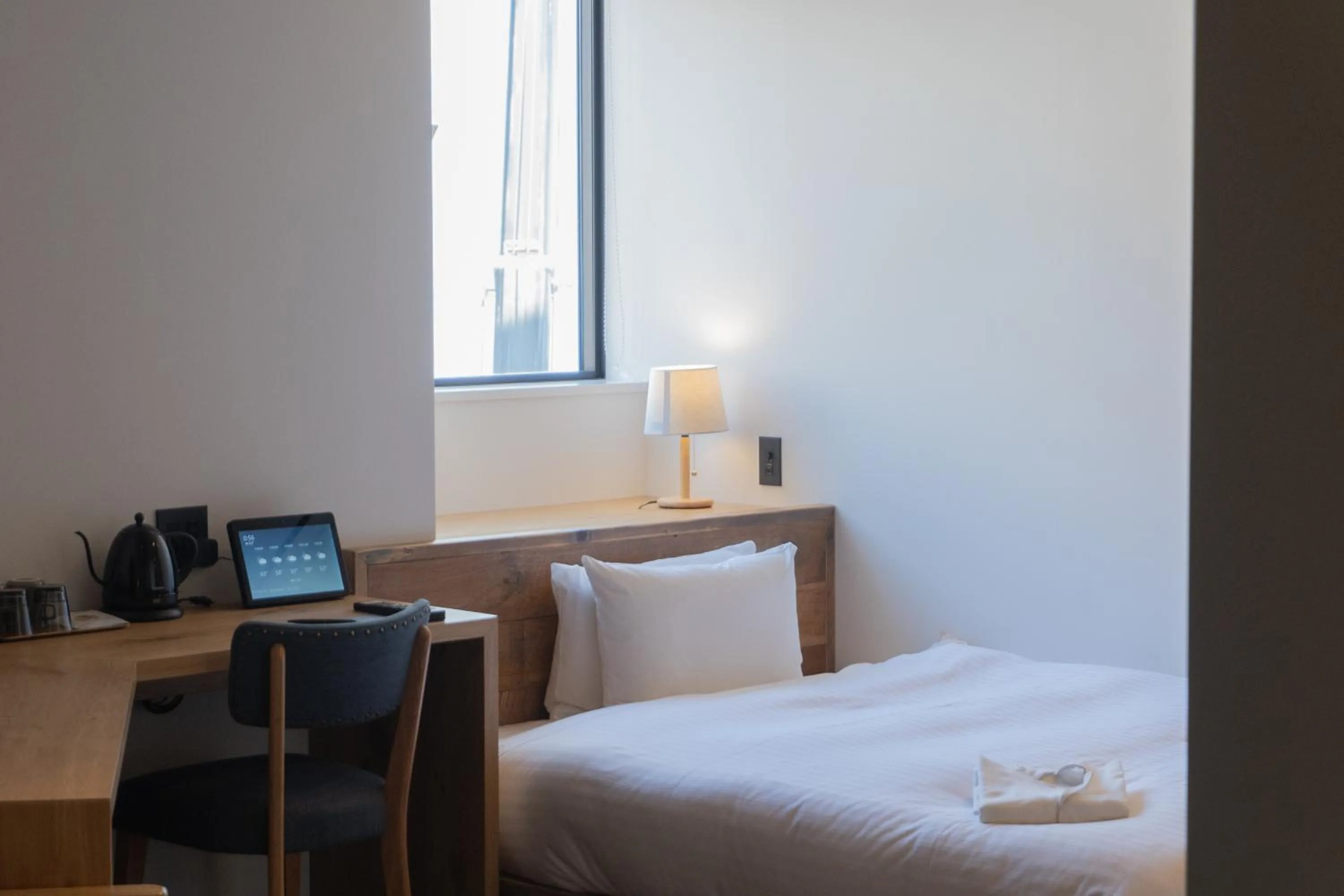 Bed in Hotel Mei Fukuoka Tenjin