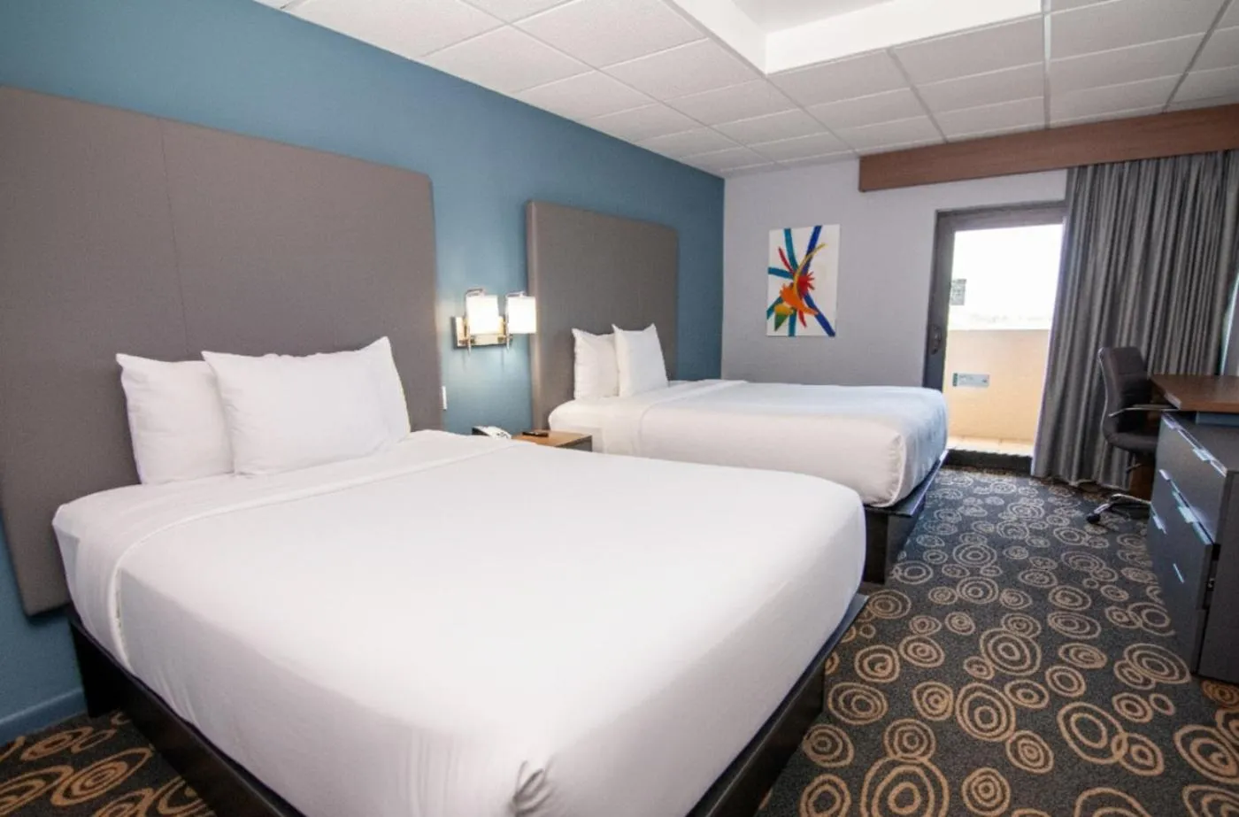 Bed in Regency Miami Airport by Sonesta