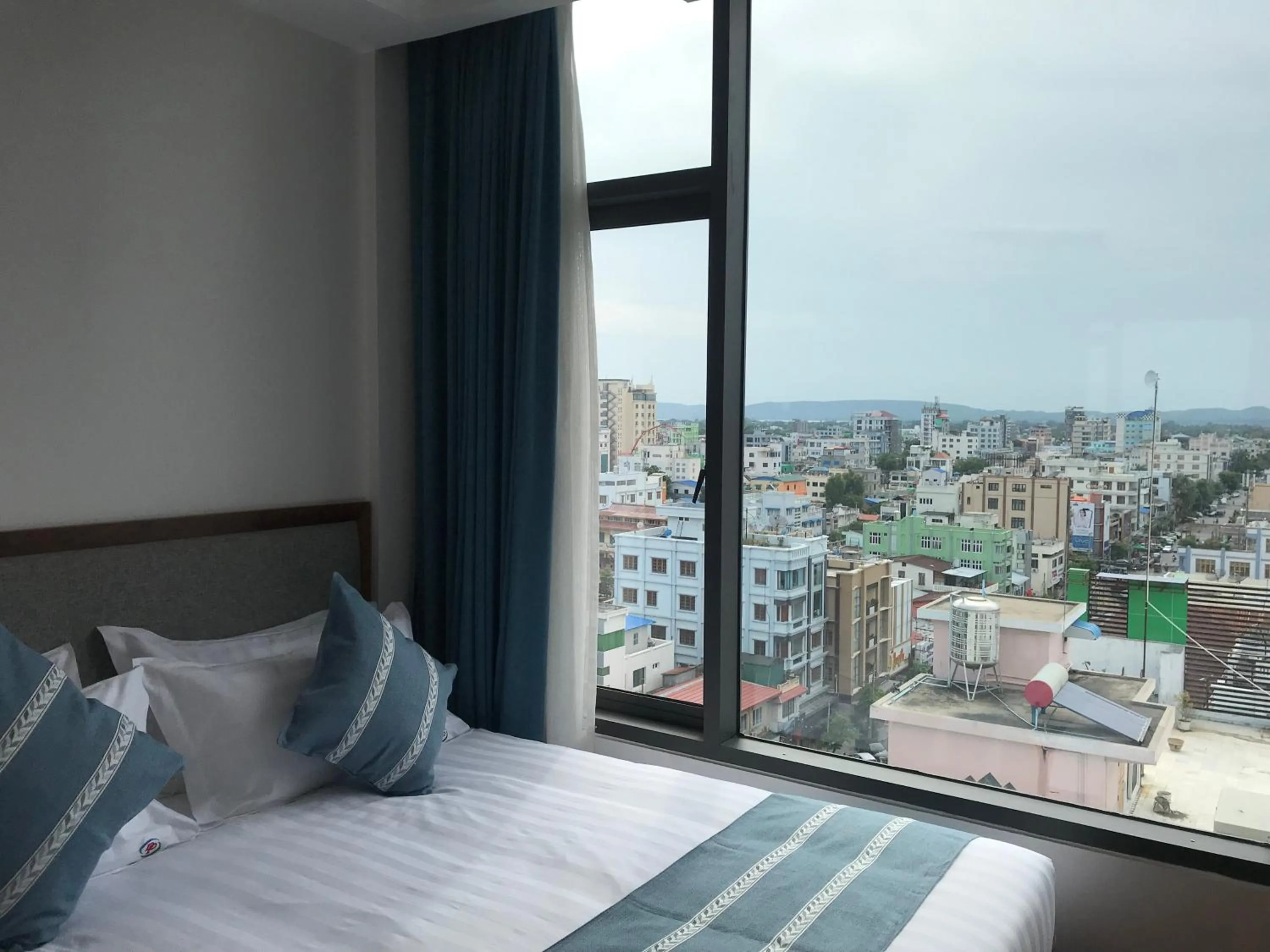 City view, Bed in Dragon Phoenix Hotel