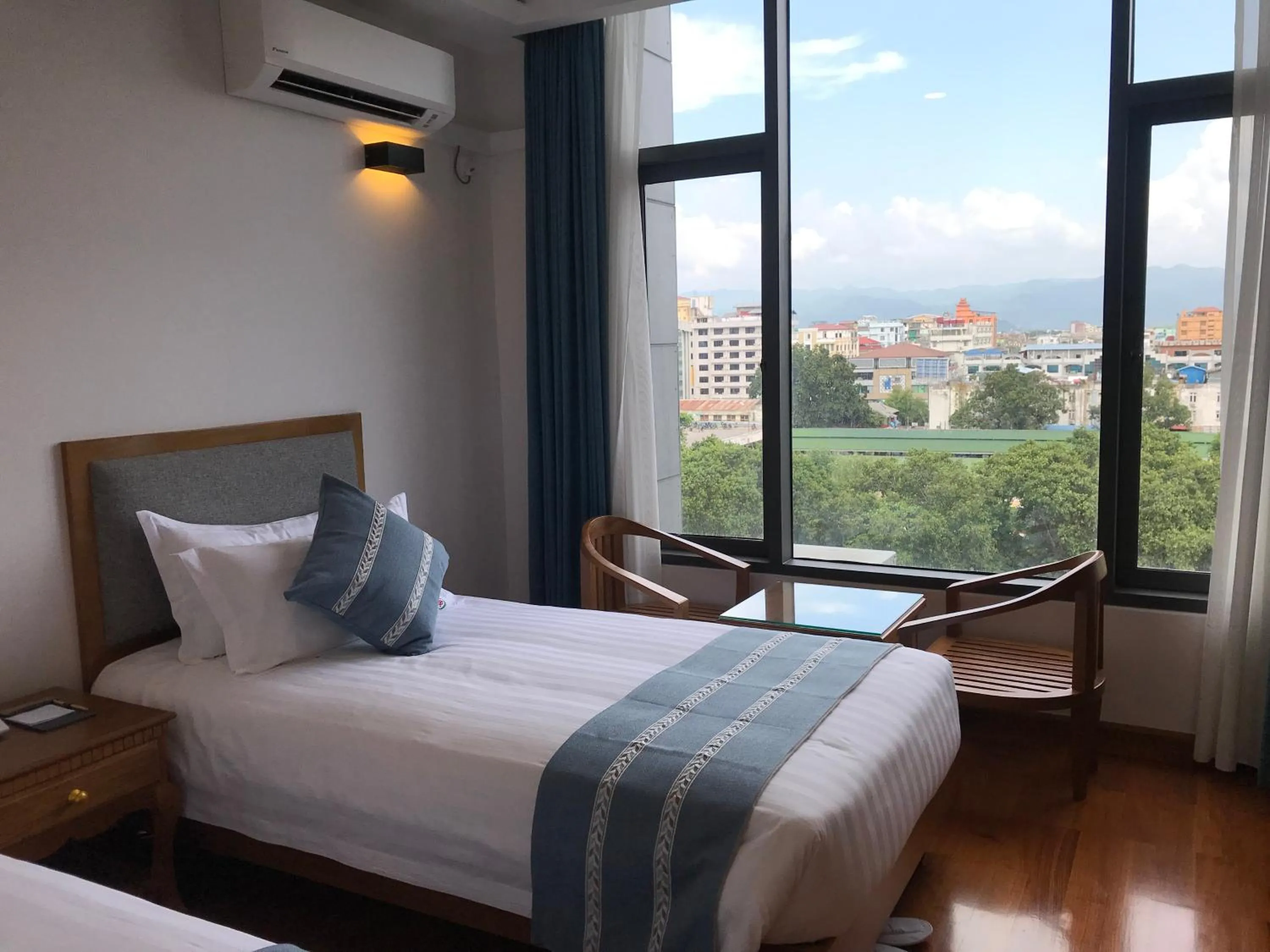 Photo of the whole room, Bed in Dragon Phoenix Hotel