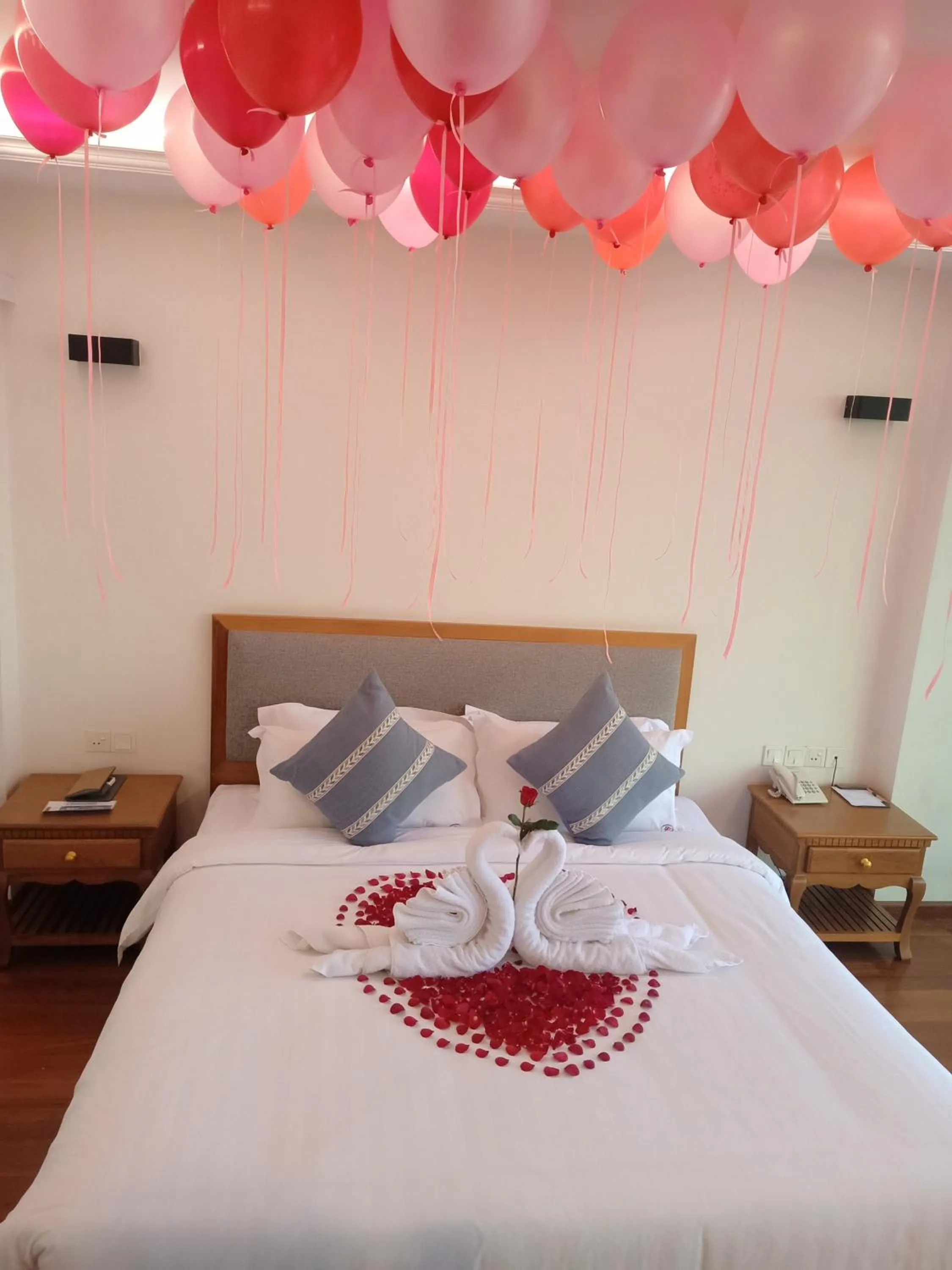 Bed in Dragon Phoenix Hotel