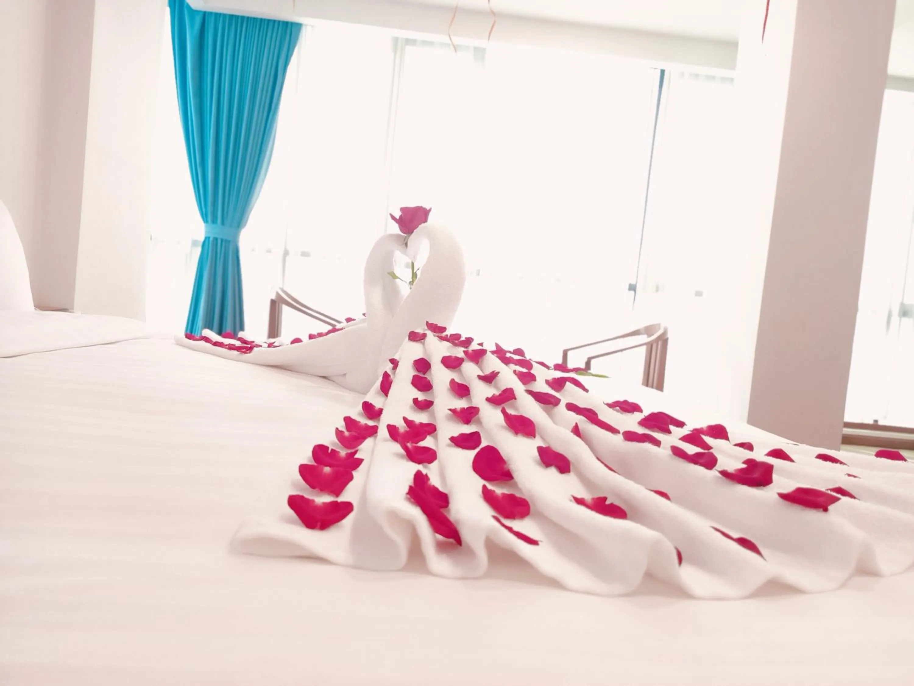 Bed in Dragon Phoenix Hotel