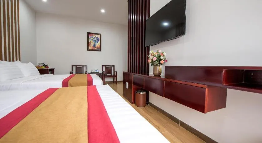 Bed in Dac Tin Luxury Hotel