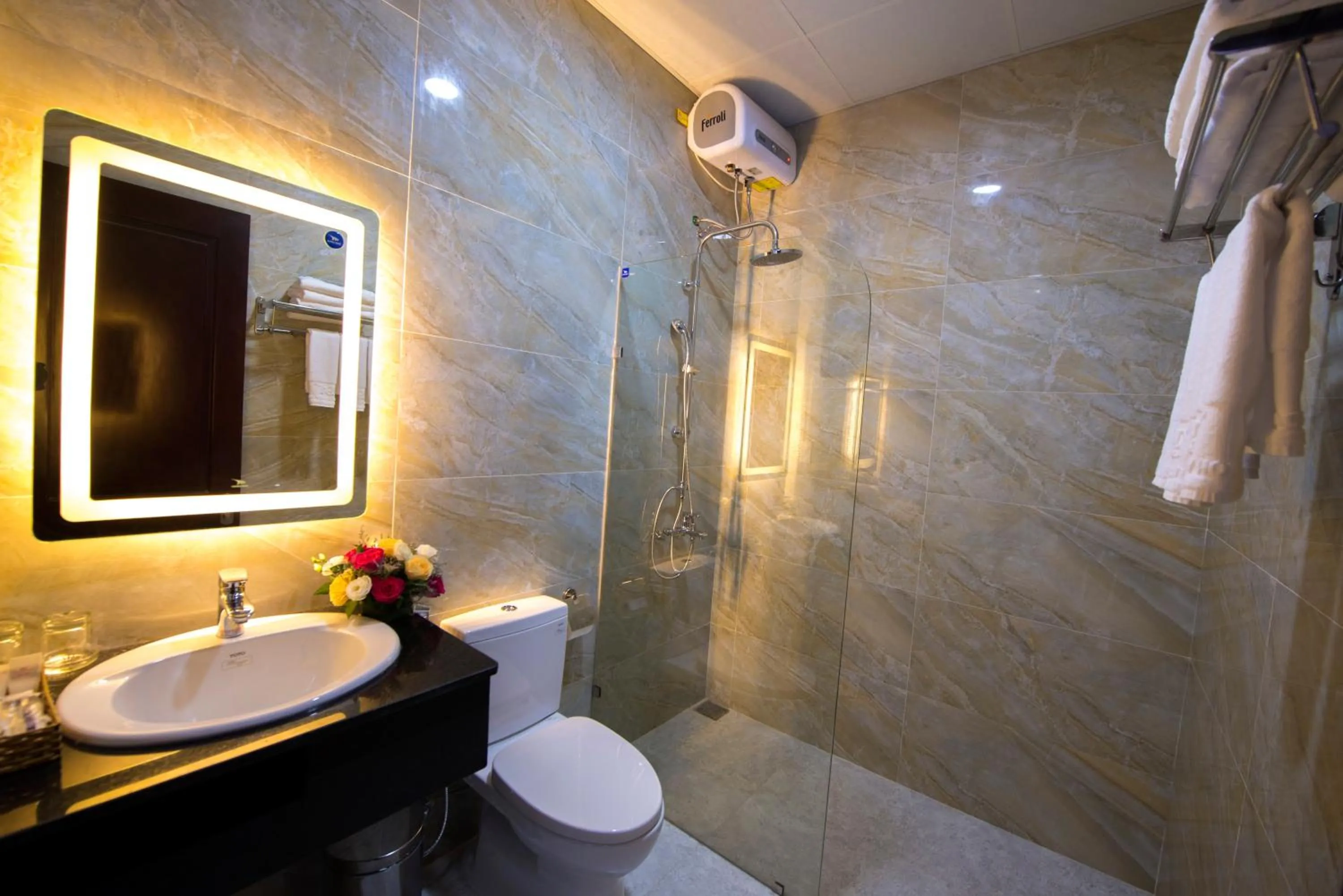 Shower in Dac Tin Luxury Hotel