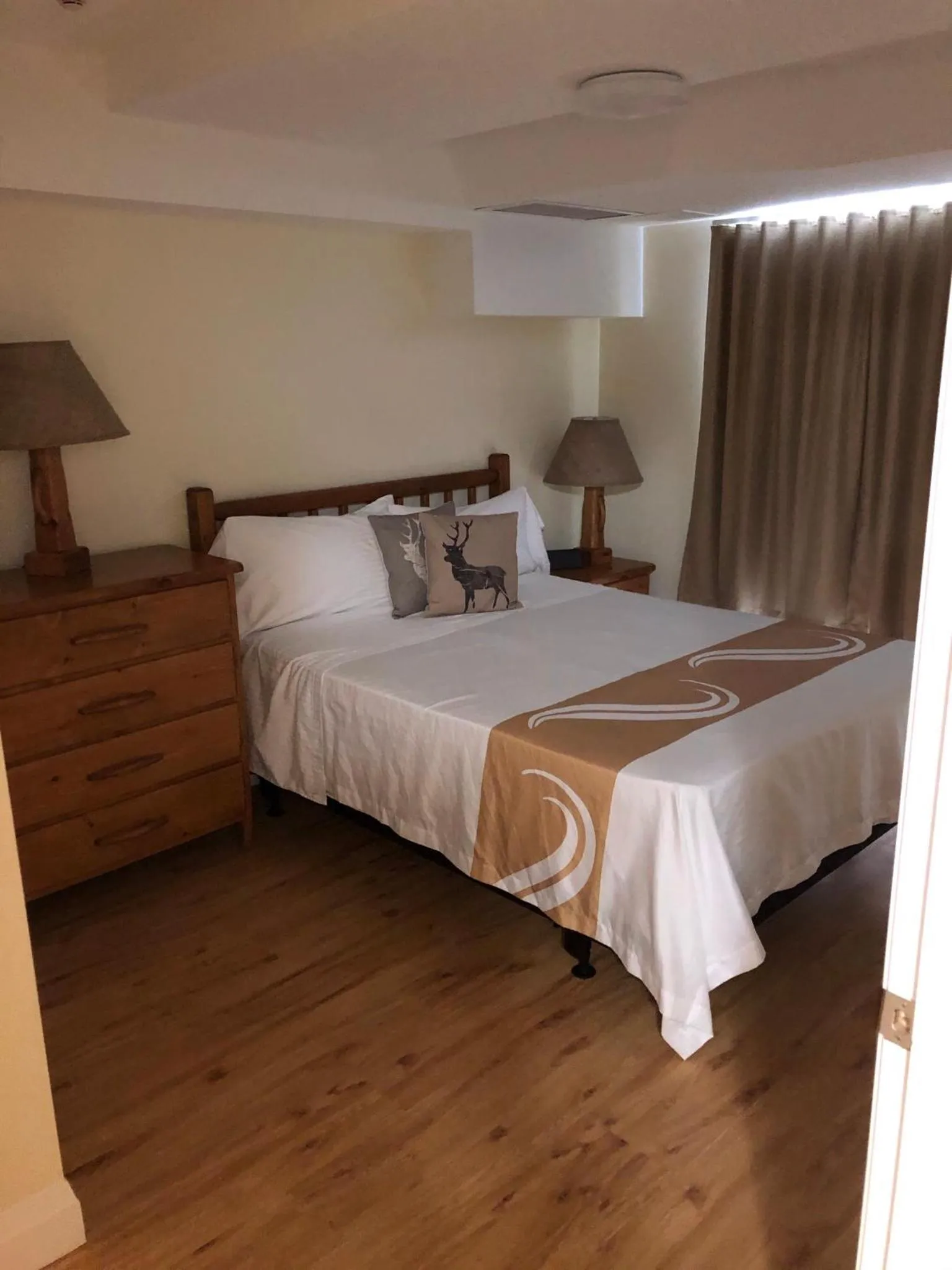 Bed in Muskoka Lakes Hotel and Resorts