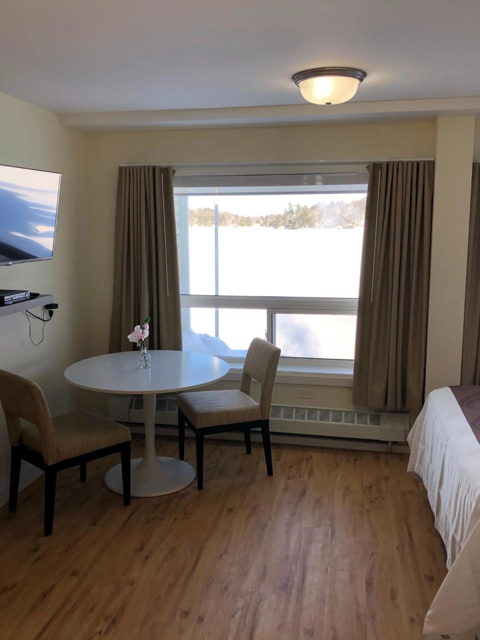 Bed in Muskoka Lakes Hotel and Resorts