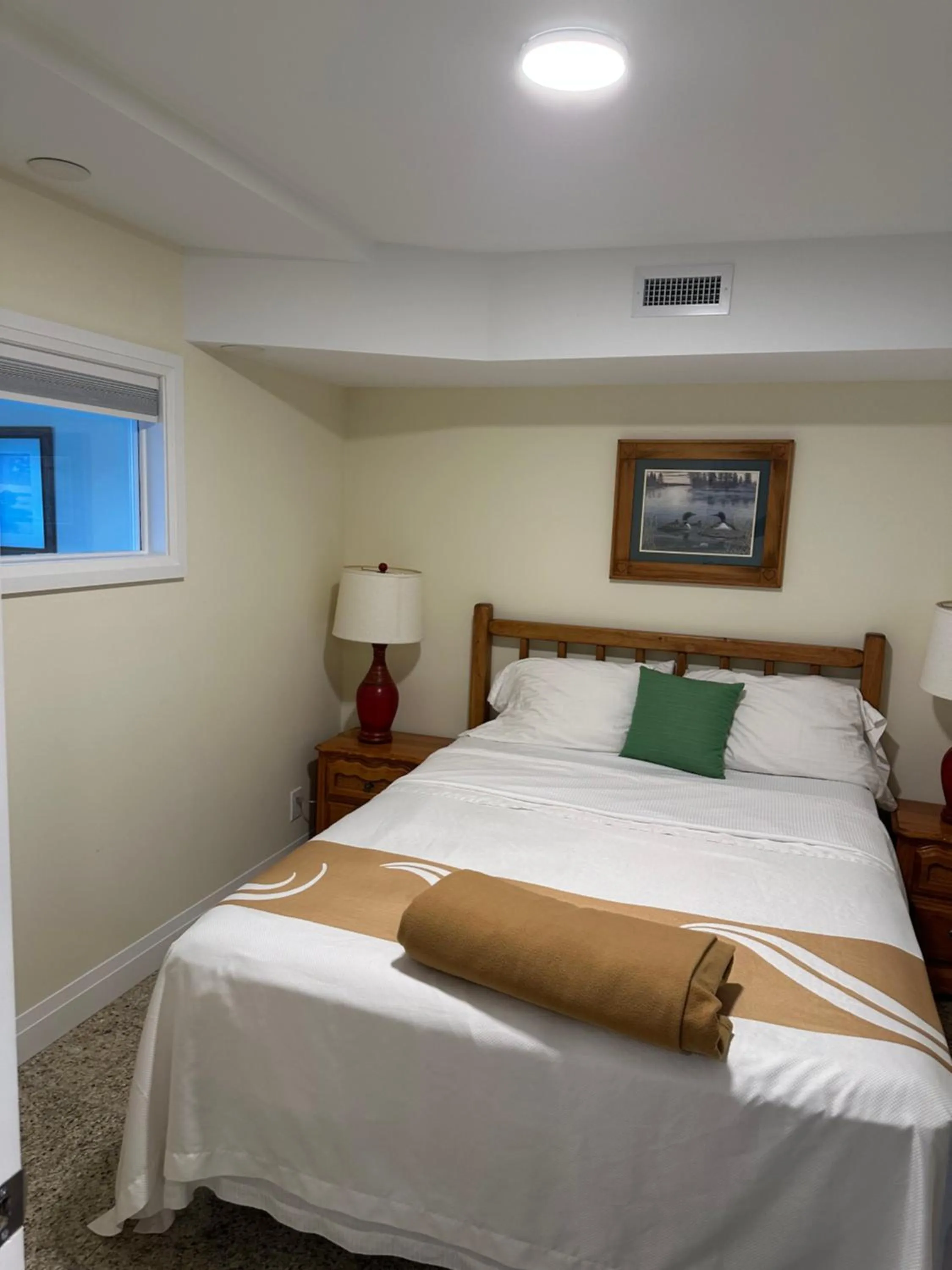 Bed in Muskoka Lakes Hotel and Resorts