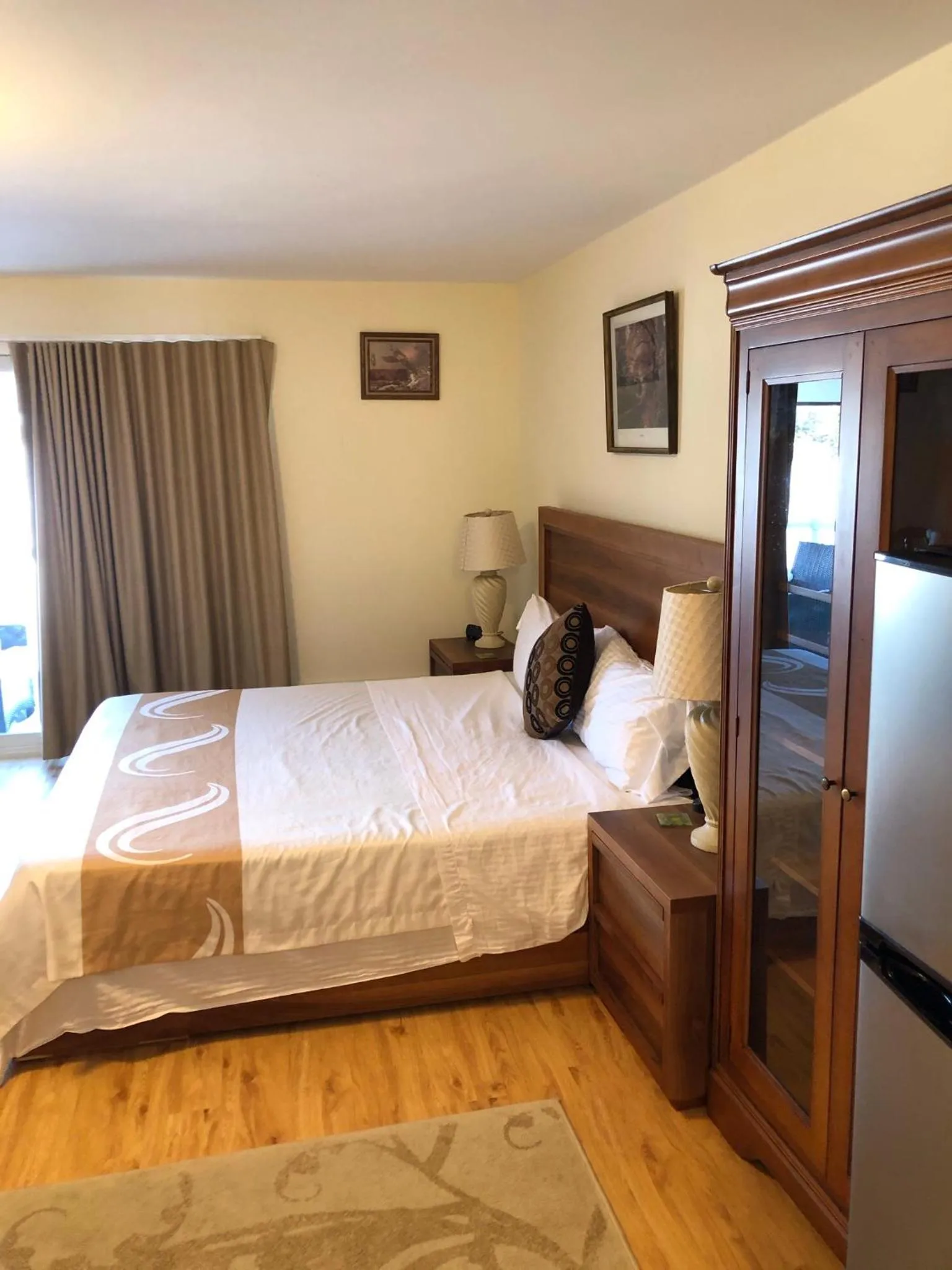 Bed in Muskoka Lakes Hotel and Resorts