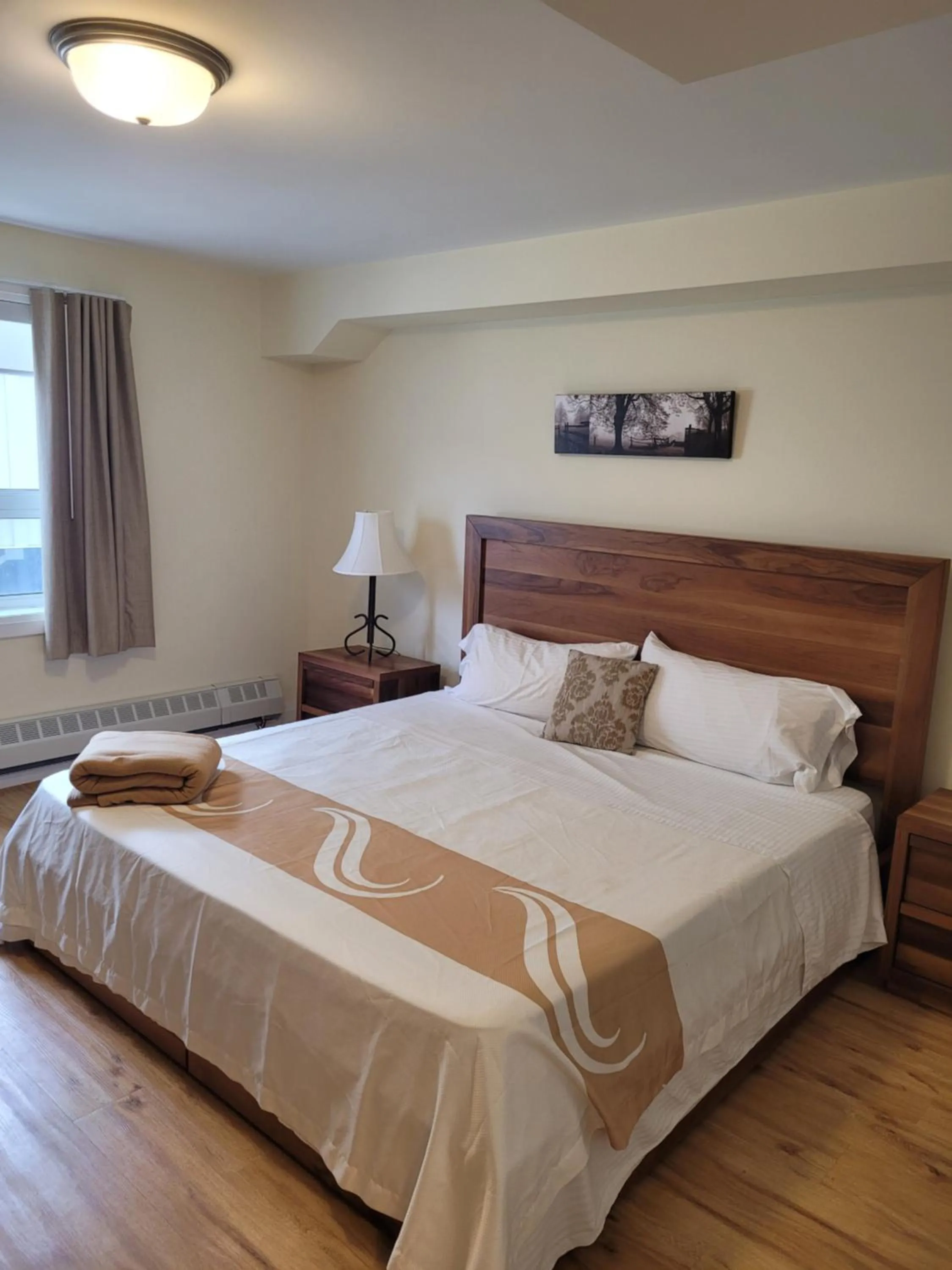 Bed in Muskoka Lakes Hotel and Resorts