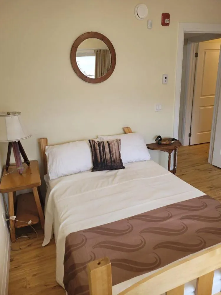 Bed in Muskoka Lakes Hotel and Resorts