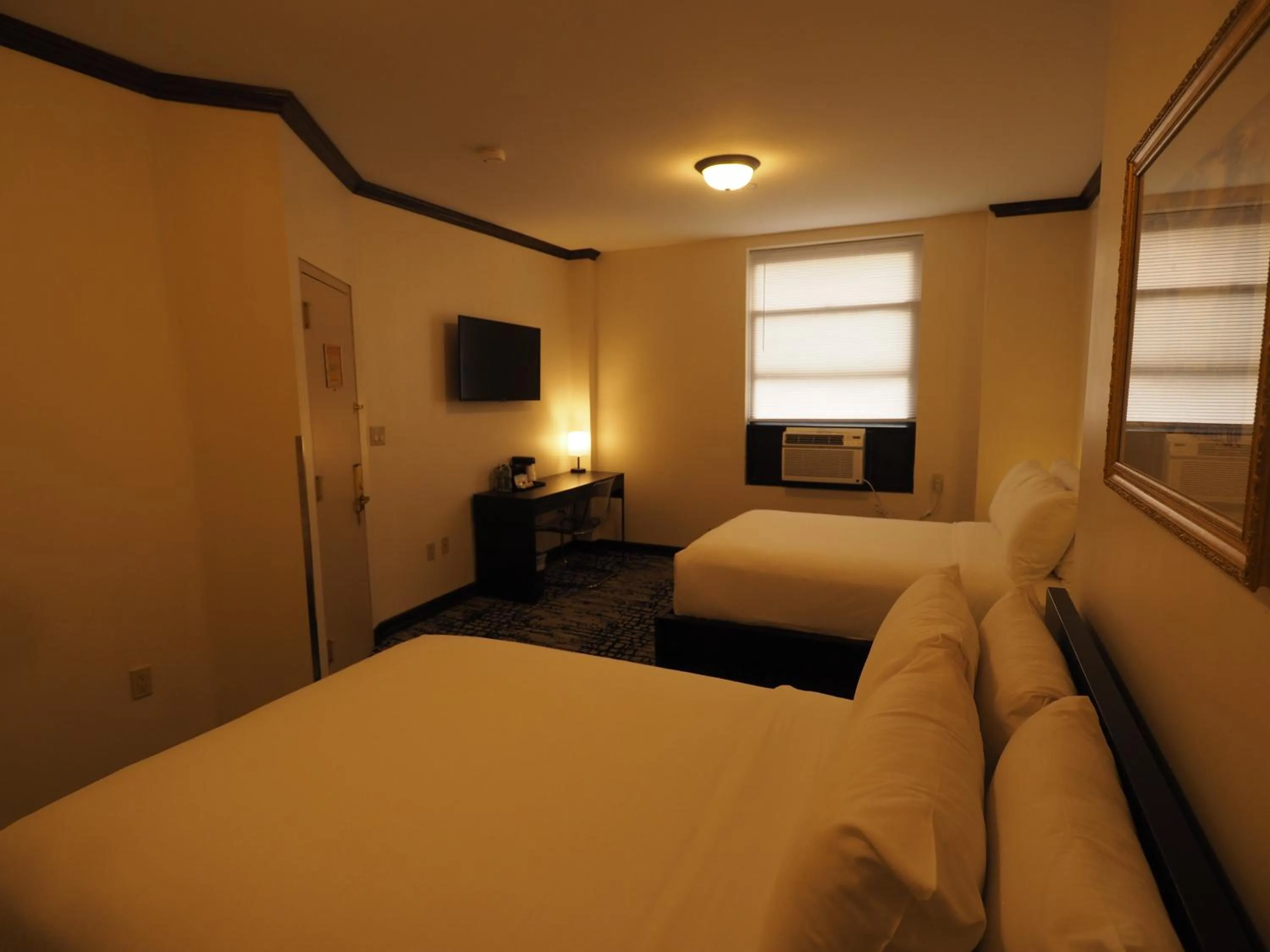 Bed in Night Hotel Broadway