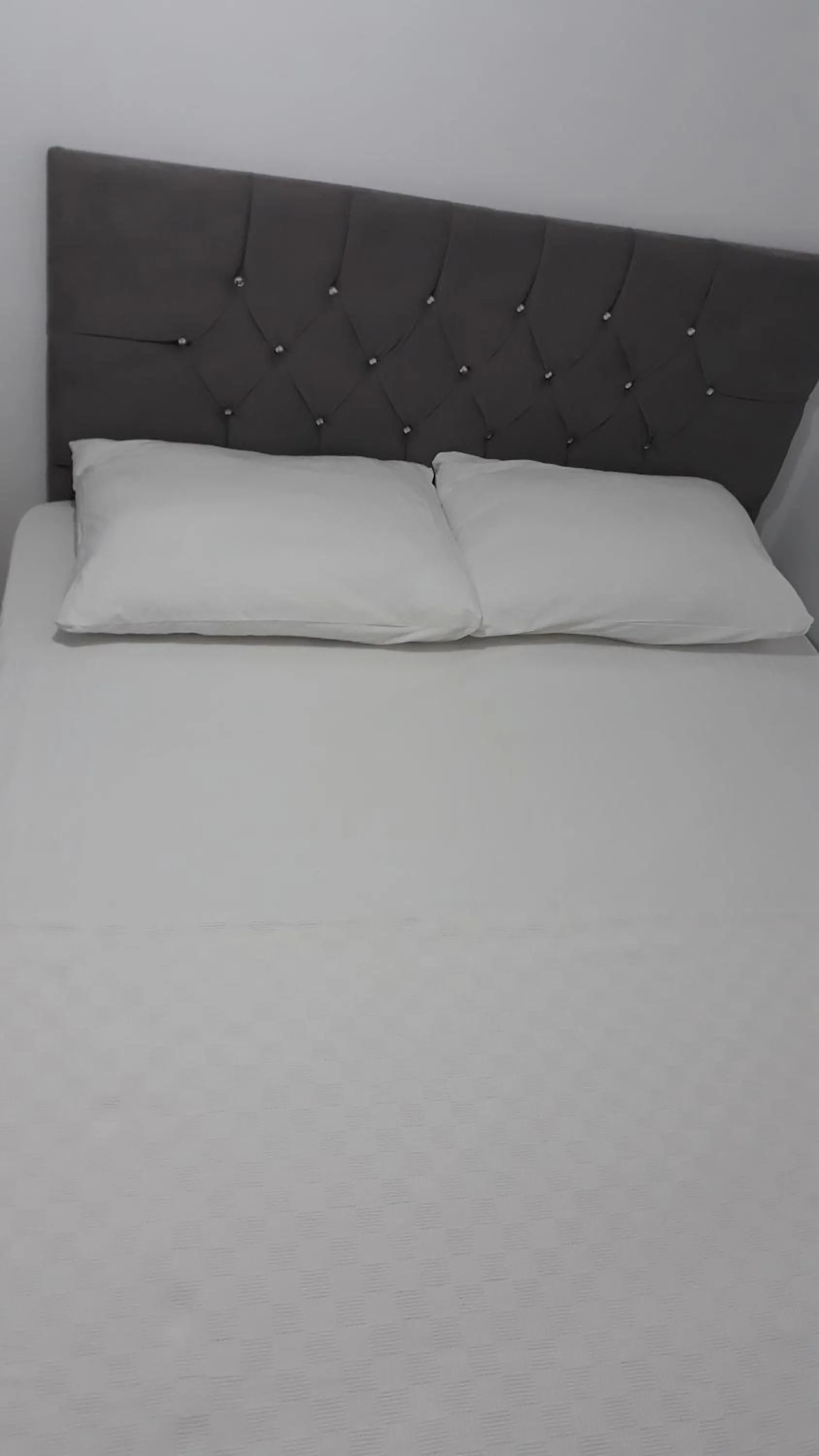 Bed in ÇİÇEK APART OTEL