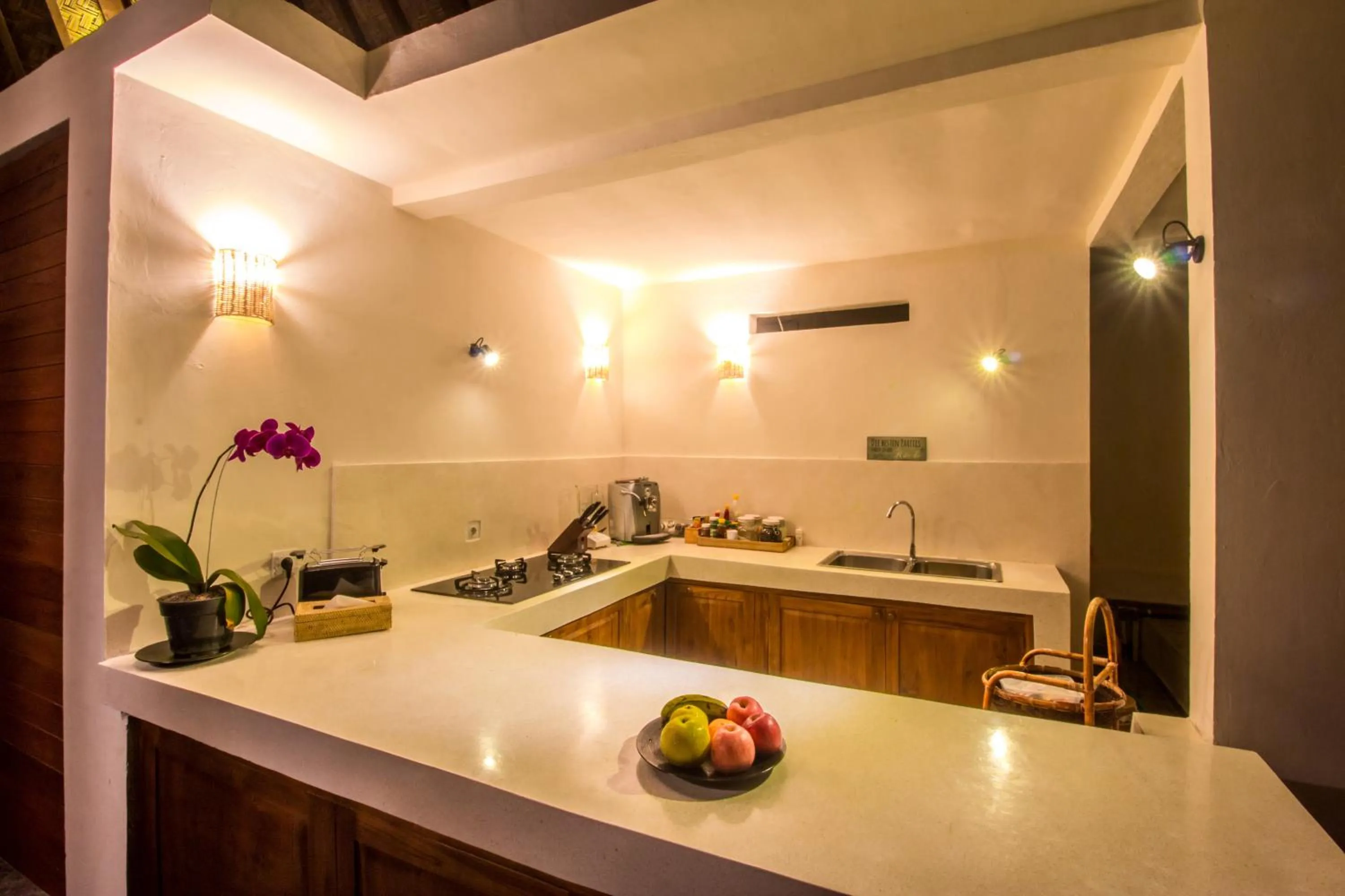 Kitchen or kitchenette in Villa Waturenggong Ubud