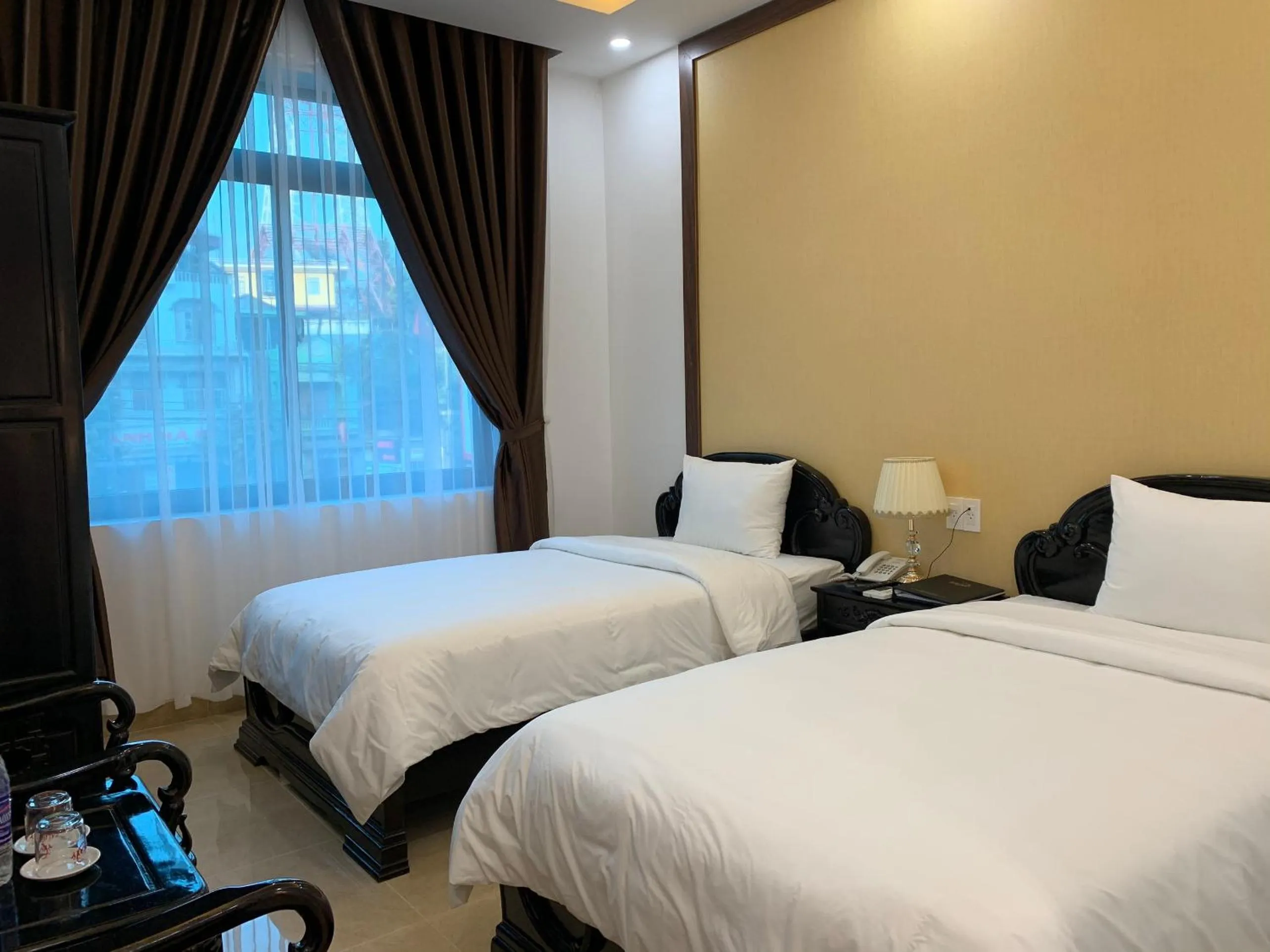 Bed in Galaxy Grand Hotel