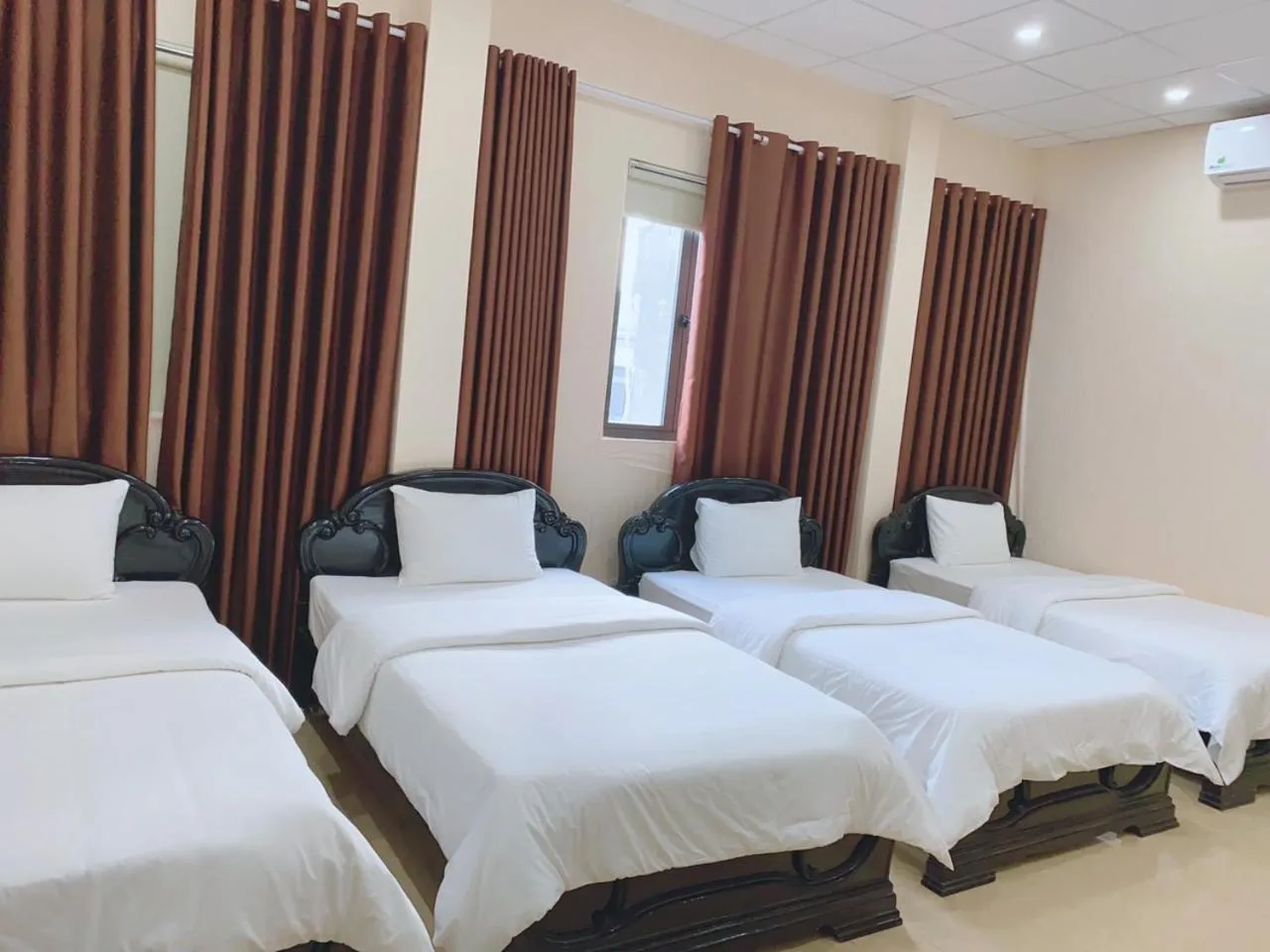 Bed in Galaxy Grand Hotel