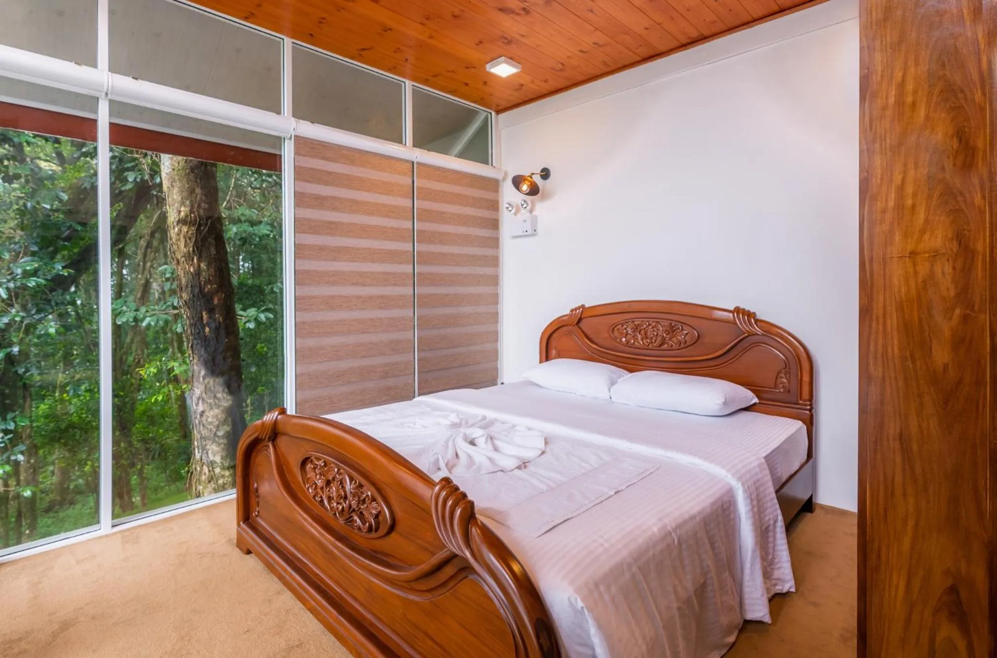 Bed in Mandaram Eco Resort