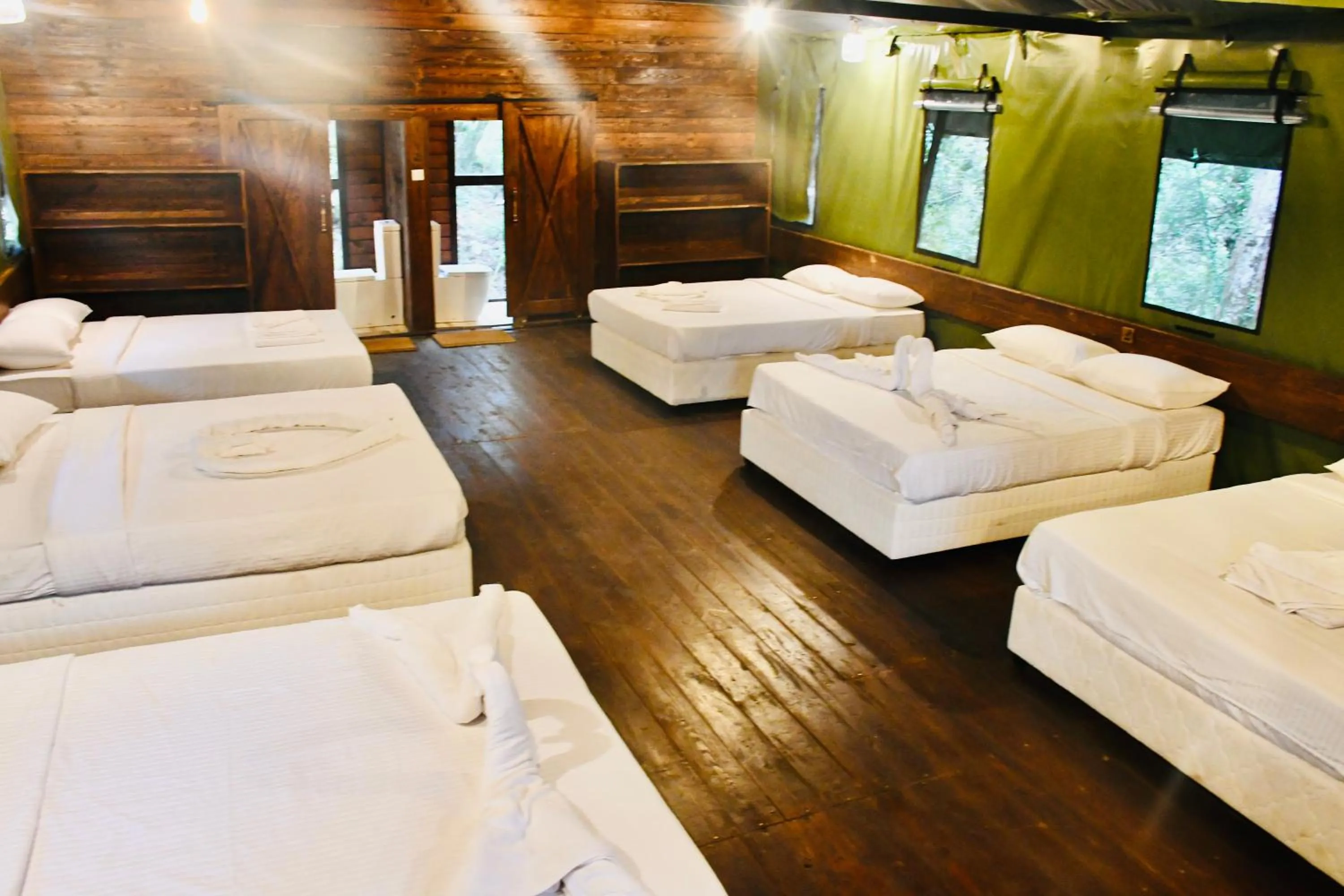 Bed in Mandaram Eco Resort