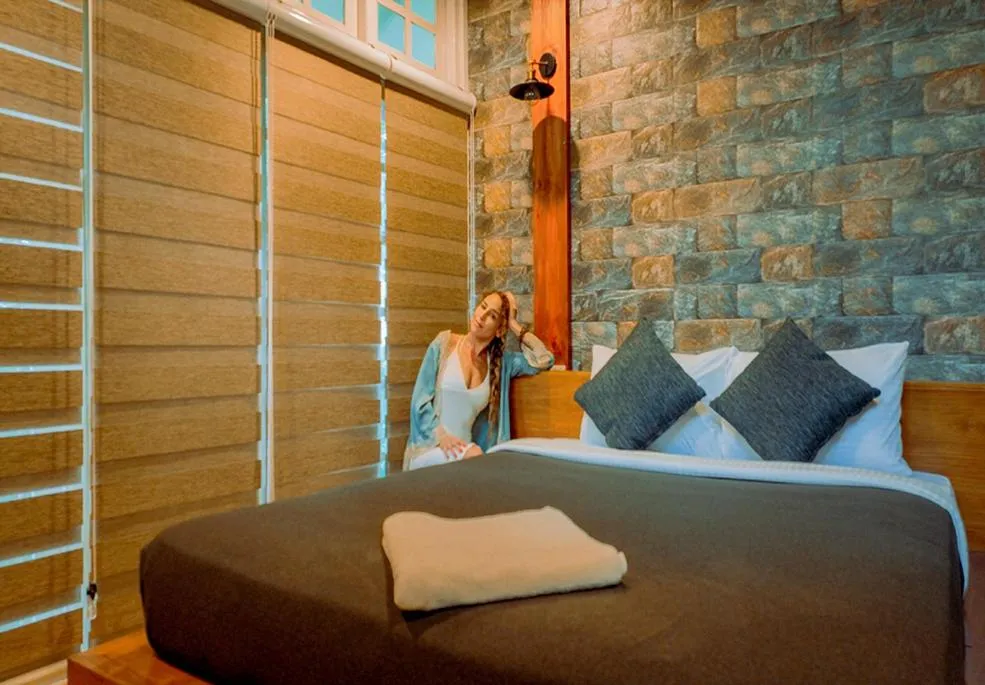 Bed in Mandaram Eco Resort