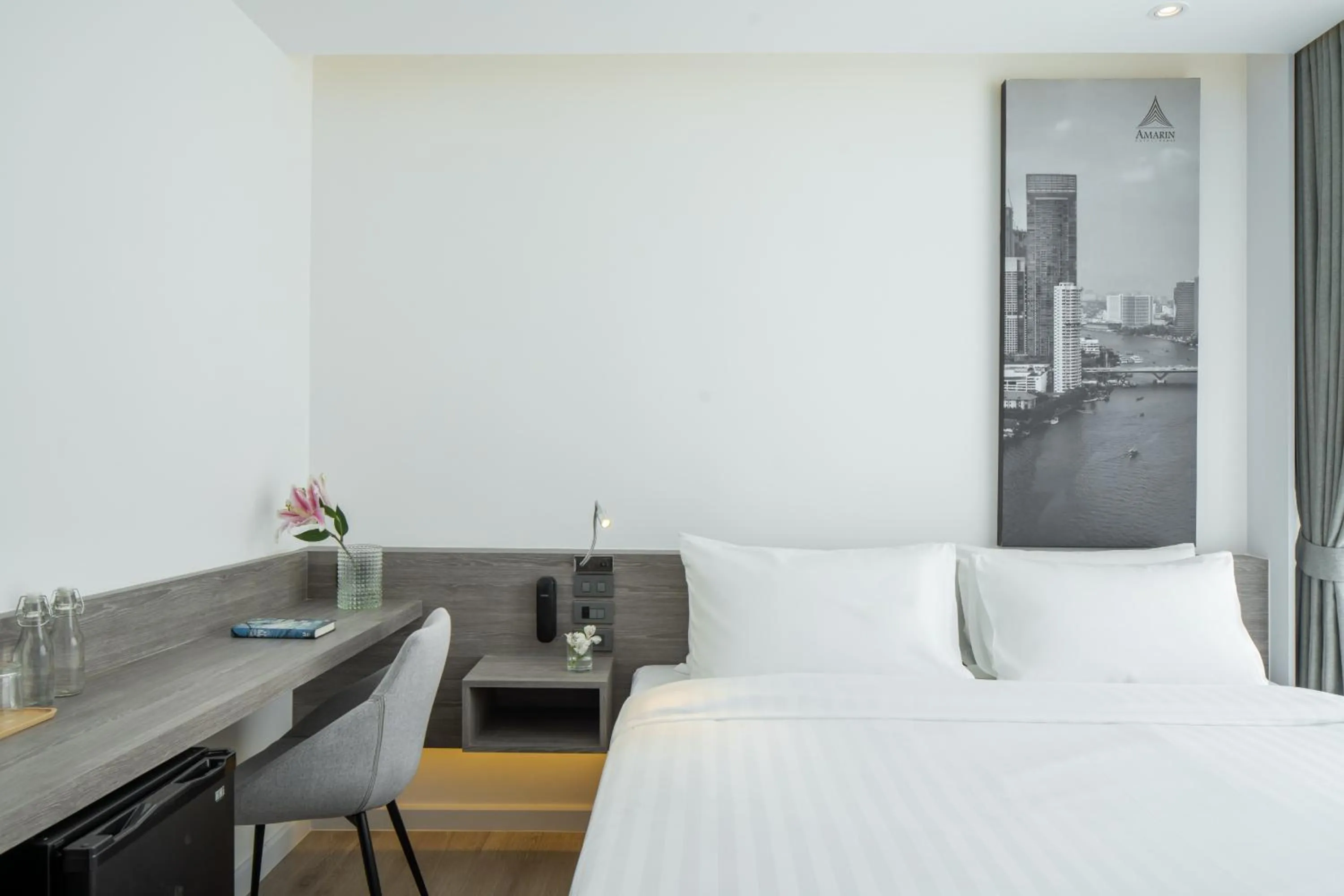 Bed in Amarin Hotel Rama 8