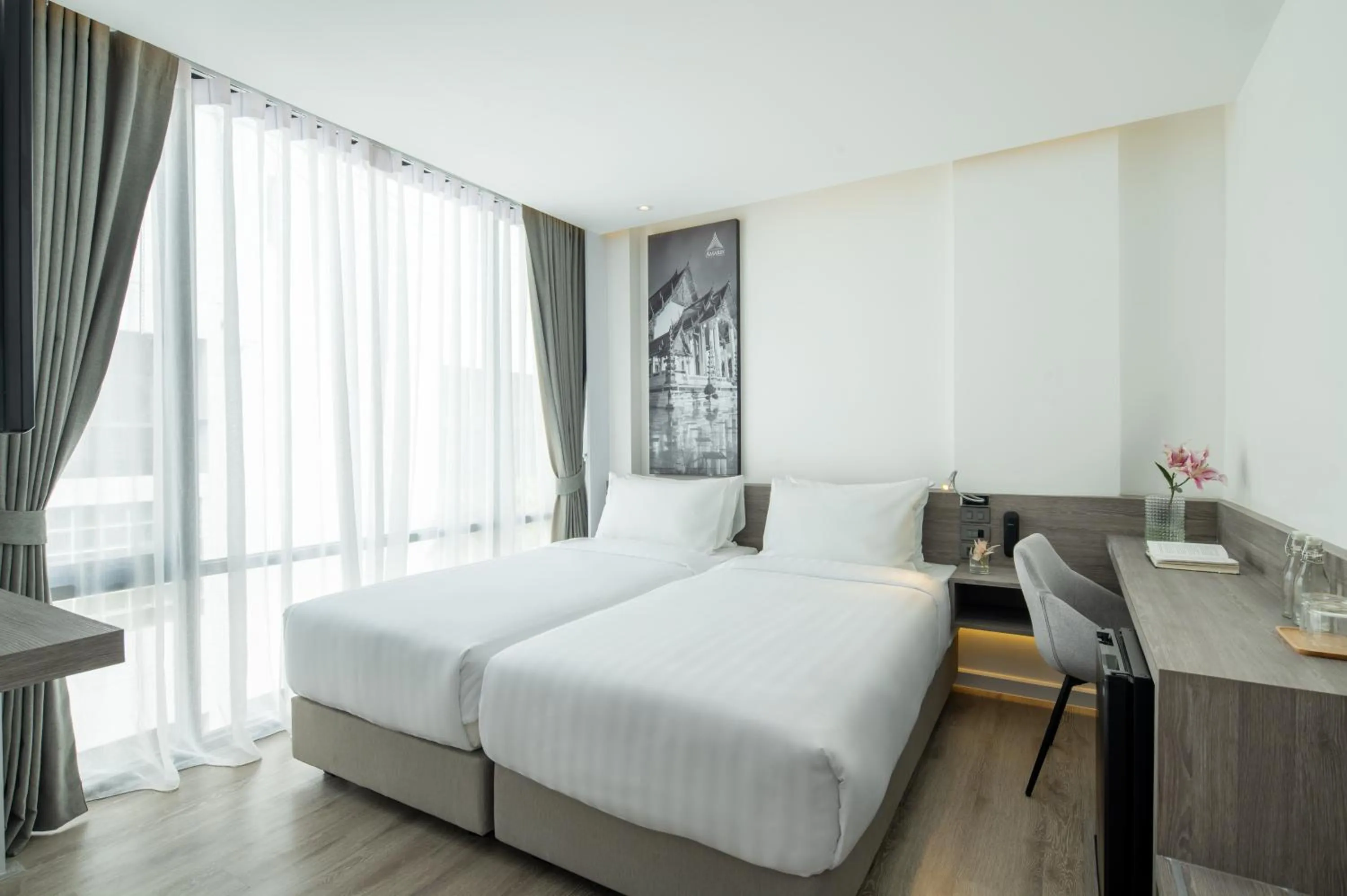 Bed in Amarin Hotel Rama 8