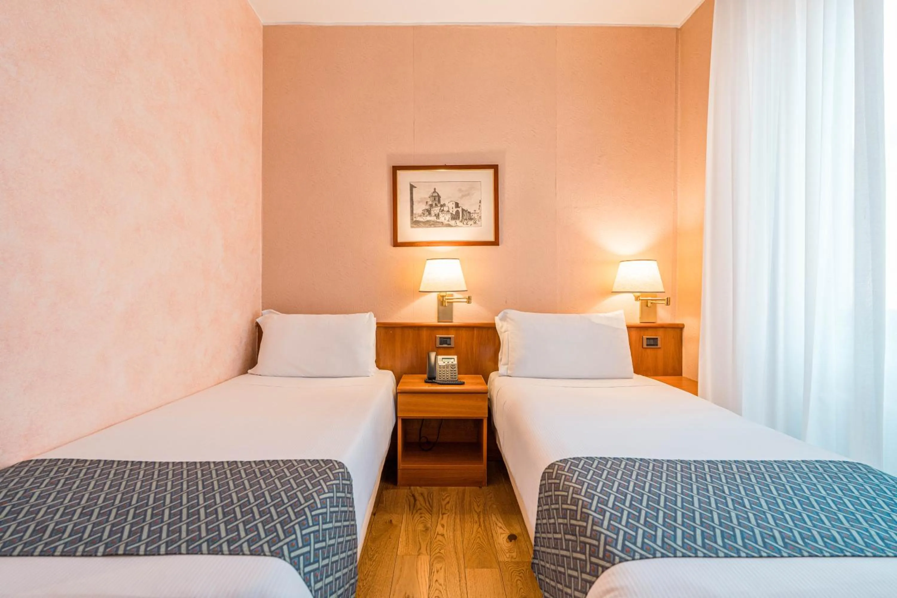 Bed in Crystal Hotel Varese