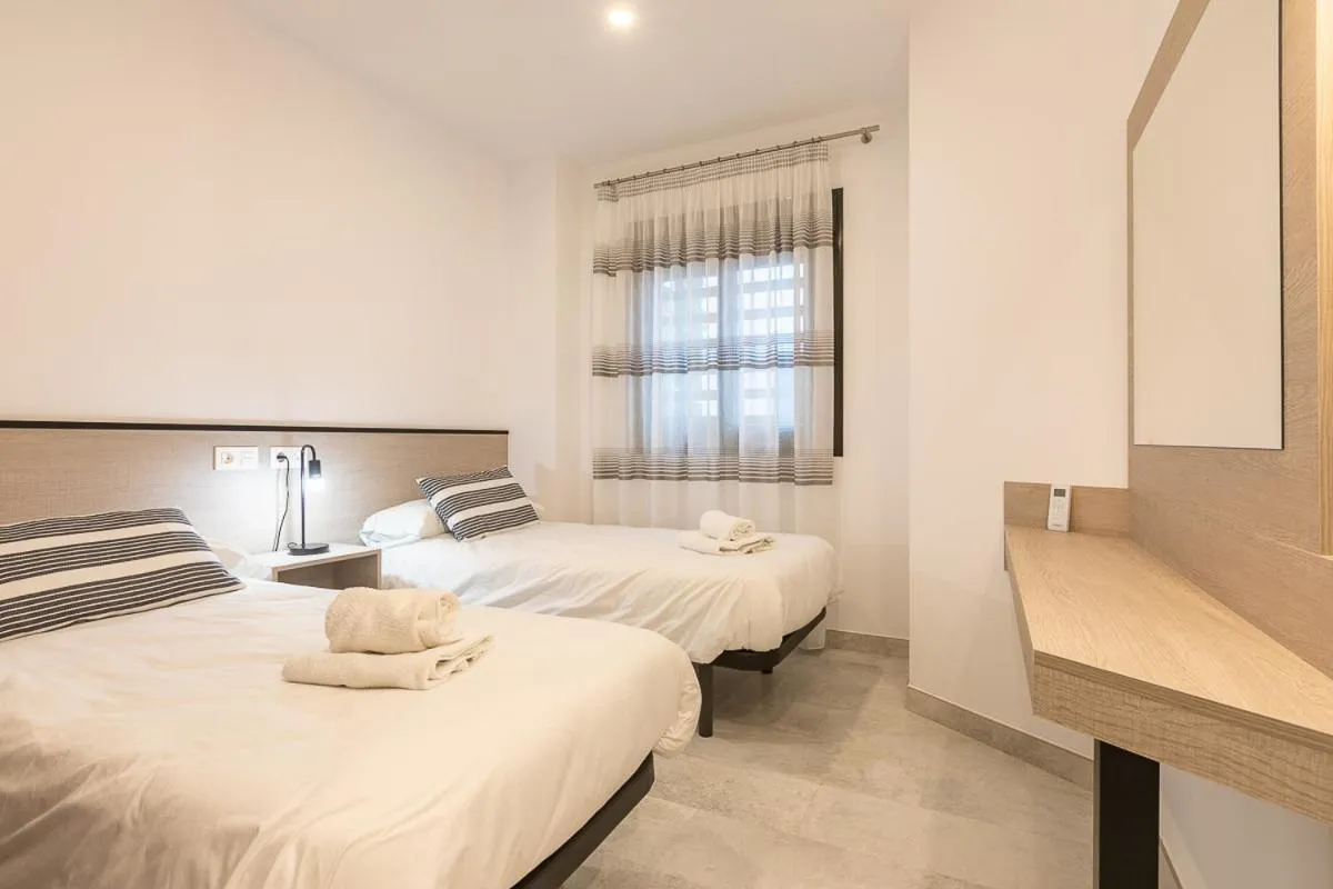 Bedroom, Bed in Apartamentos Guerrero 3