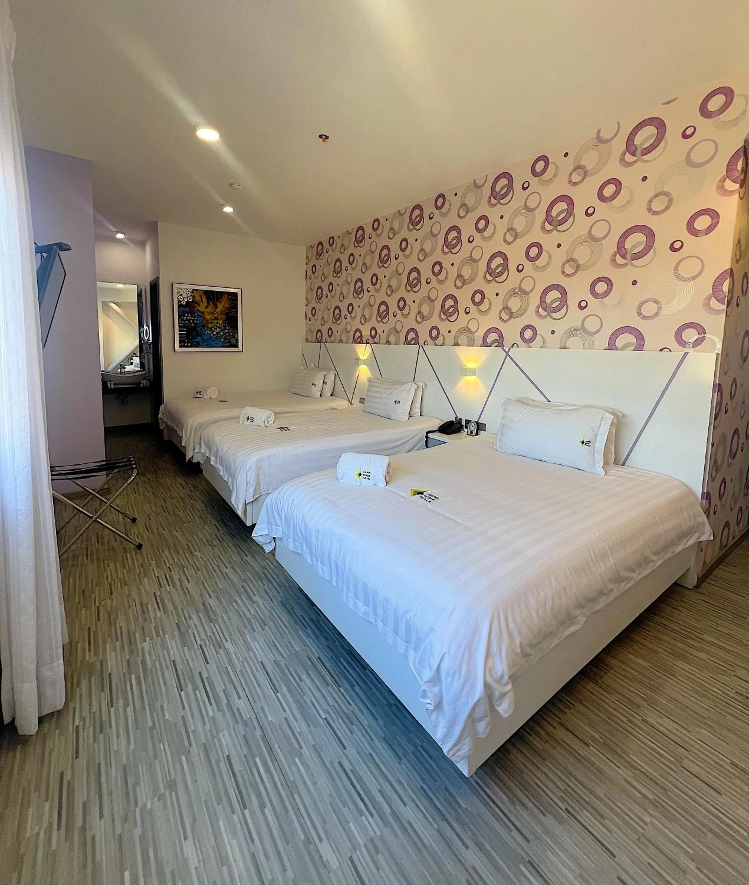 Photo of the whole room, Bed in Luma Plaza Hotel