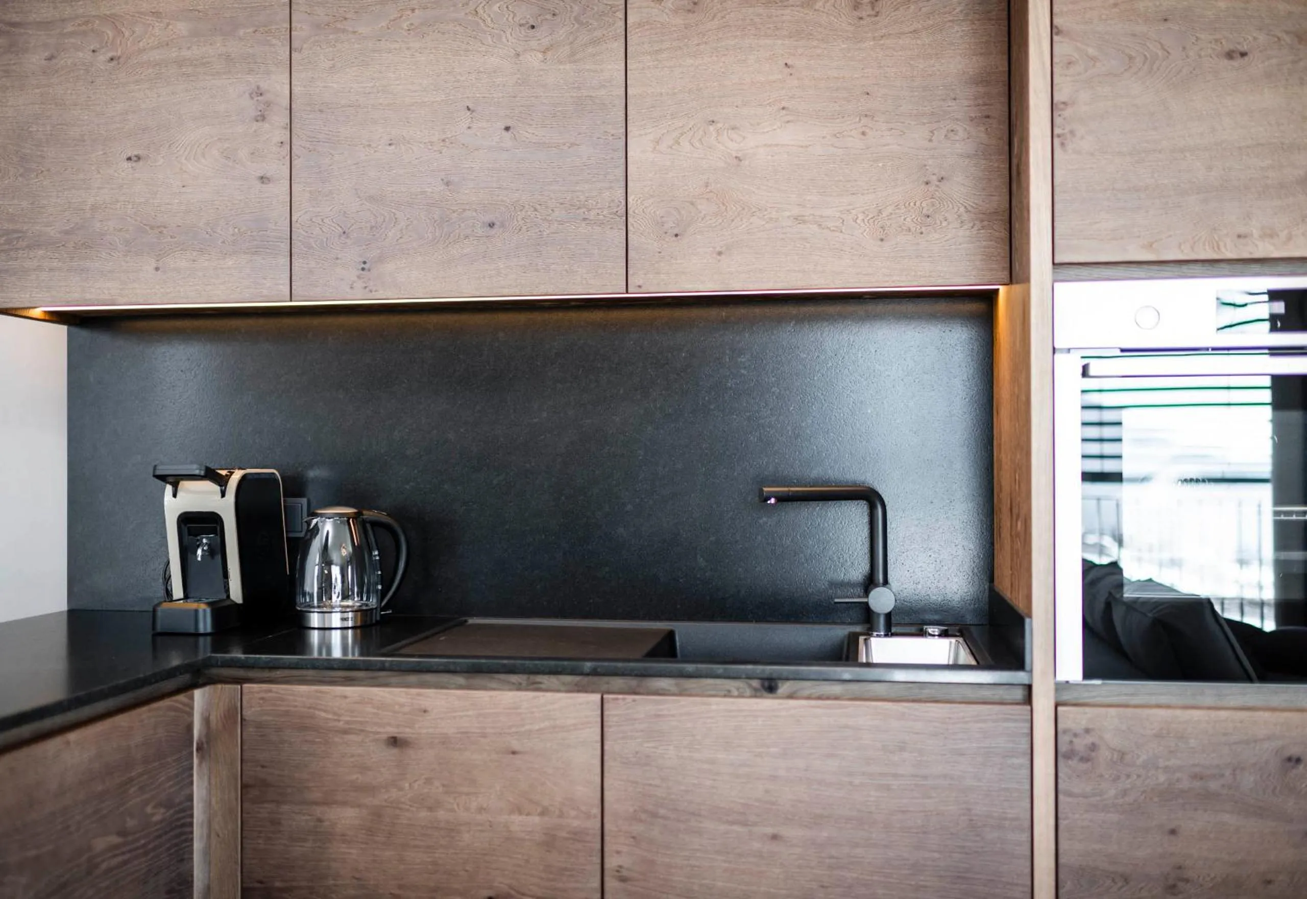 Kitchen or kitchenette in Aparthotel Panorama Living Dolomites
