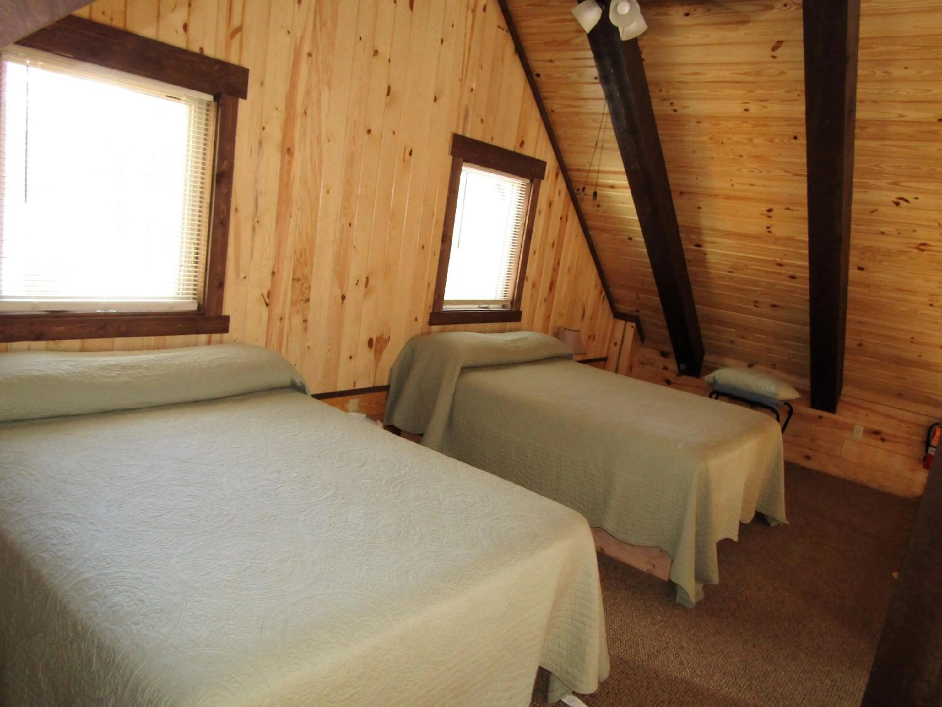 Bed in Freedom Ridge Cabins