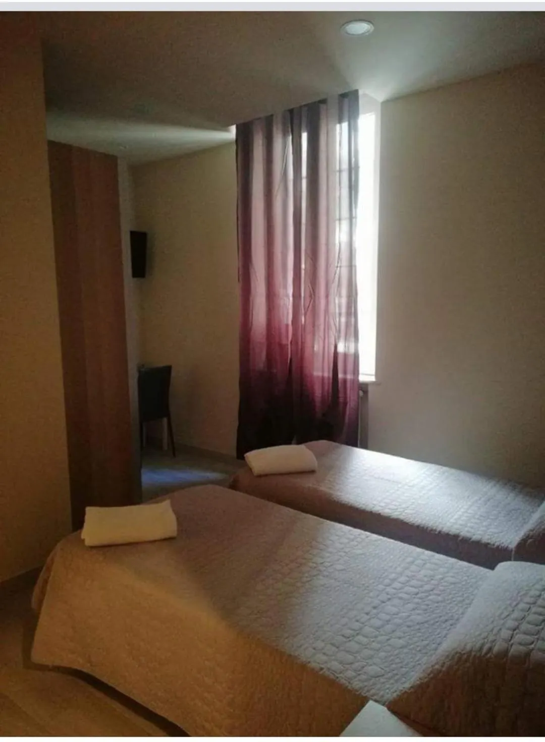 Photo of the whole room, Bed in Albergo Torino