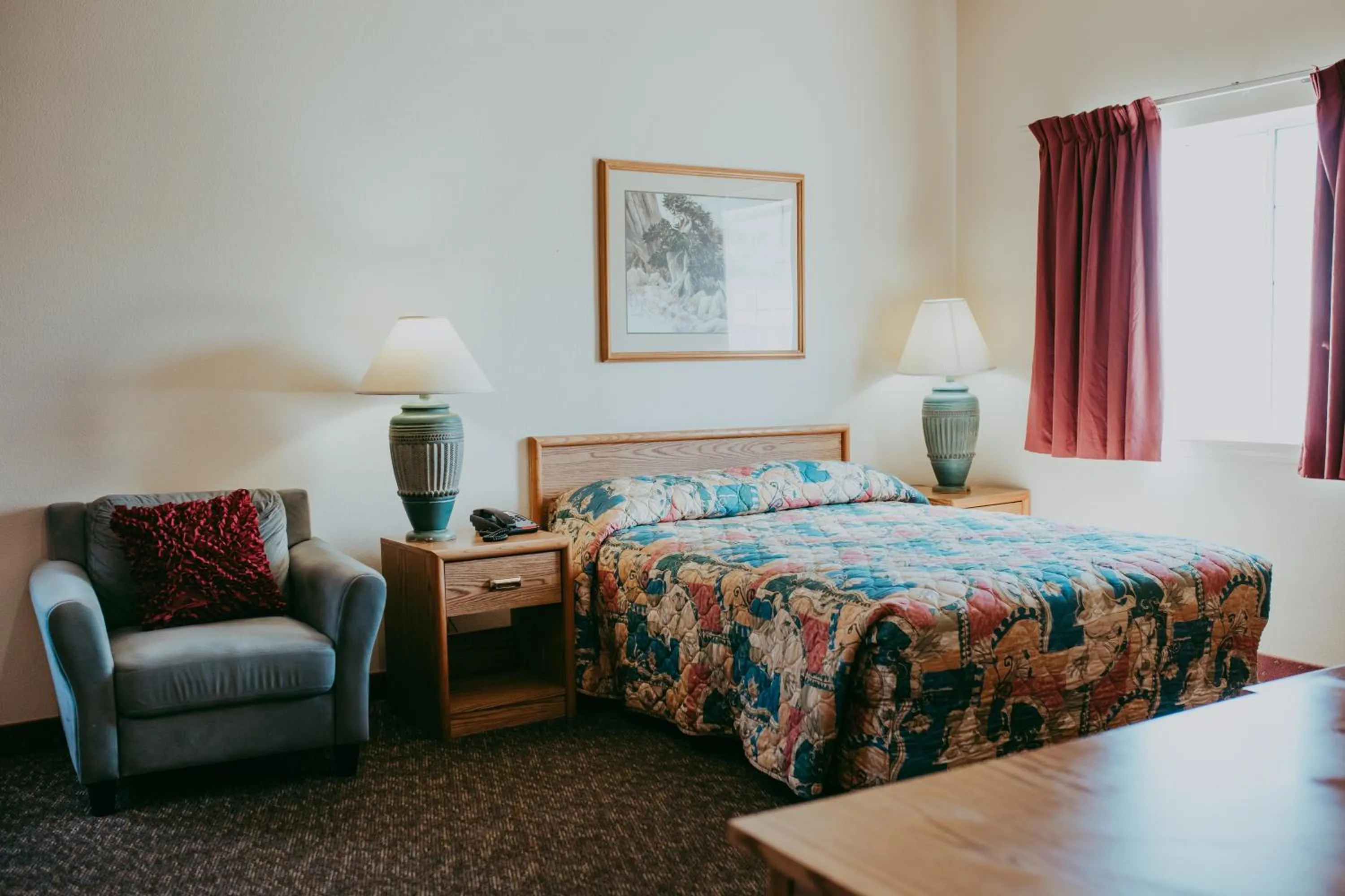 Bed in Carson City Plaza Hotel